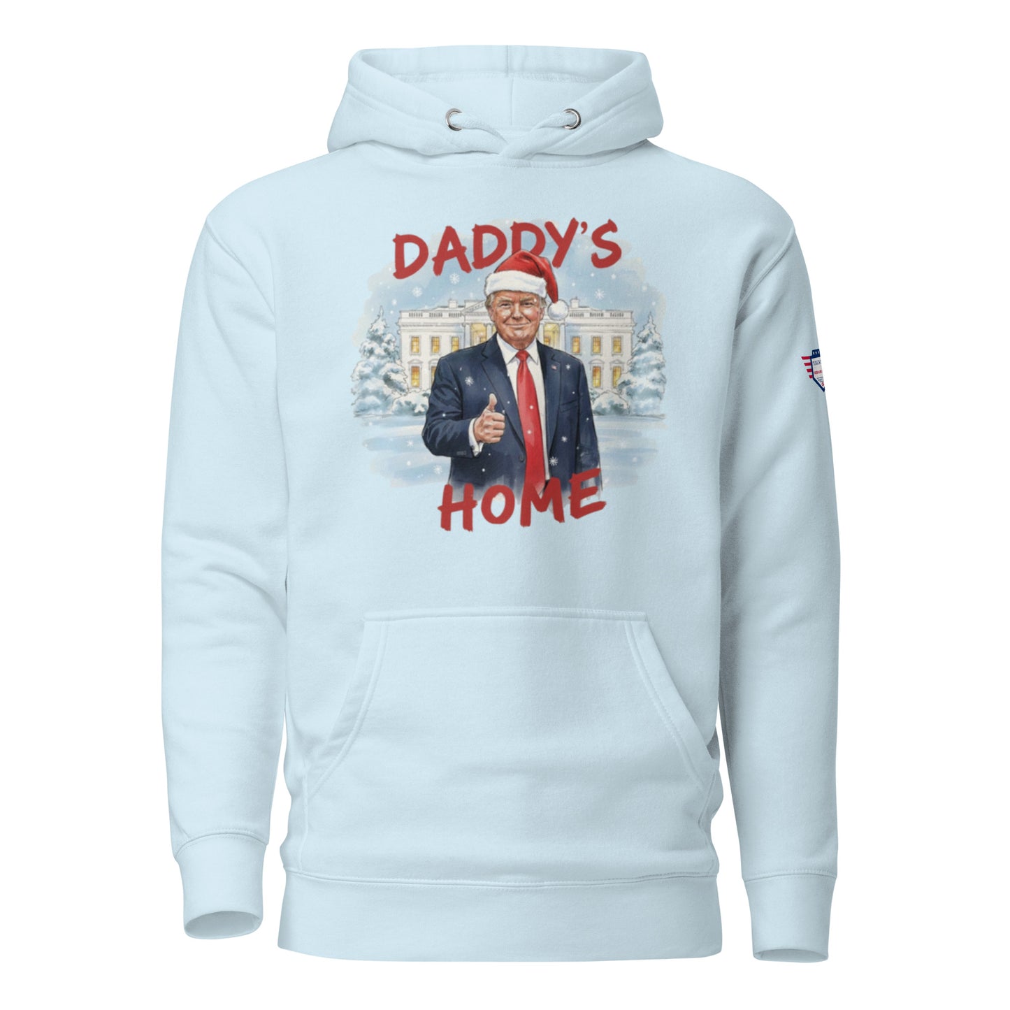 Front view of sky blue Daddy’s Home hoodie with Trump Santa thumbs-up before snowy White House