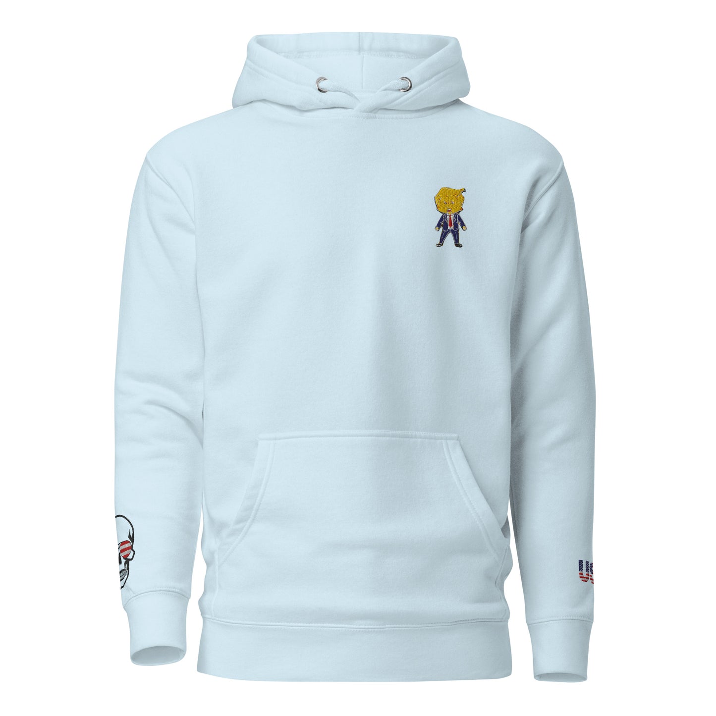 Front view of sky blue Happy Trump embroidered hoodie, golden-haired chibi Trump on chest, skull USA sleeve patch
