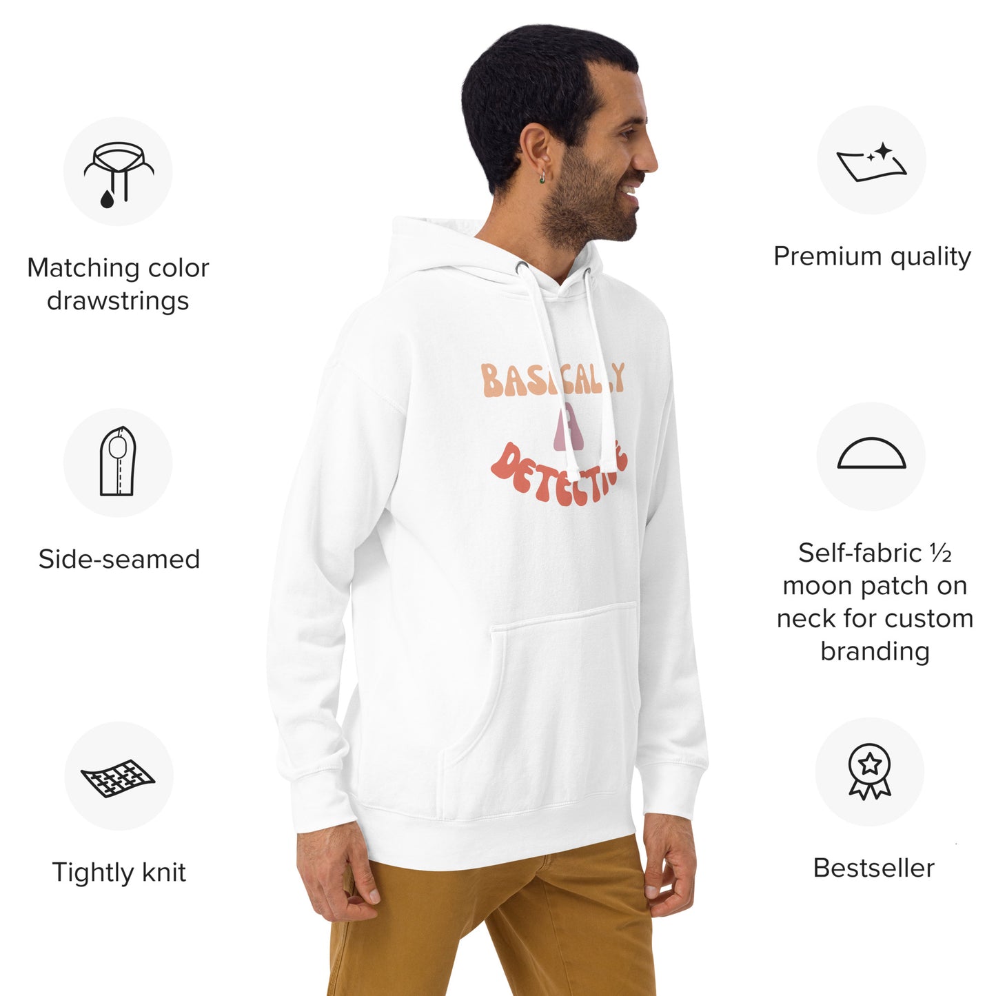 Side view of model in white unisex hoodie with orange "BASICALLY DETECTIVE" chest embroidery, feature callouts on drawstrings and knit