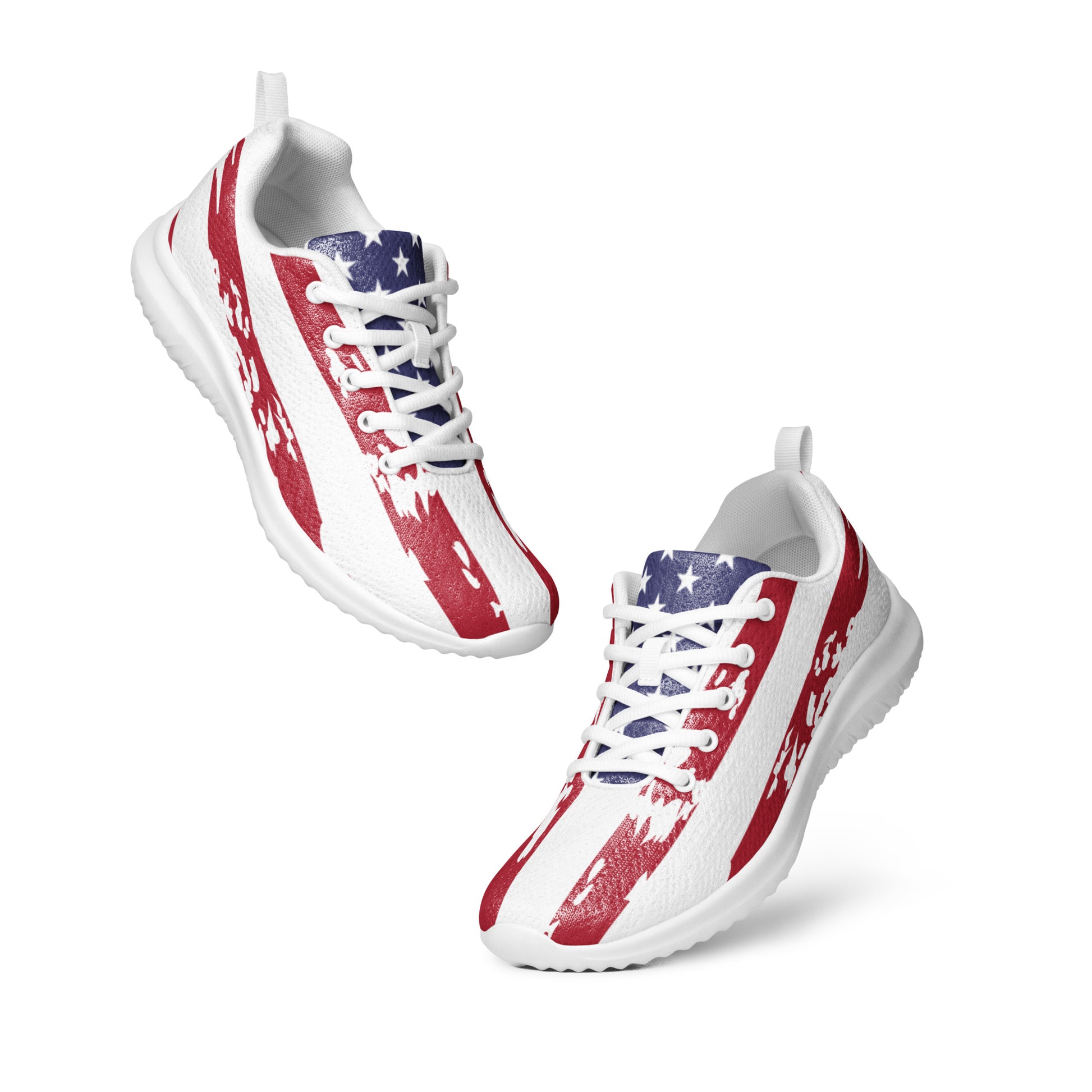 Pair of white men's athletic shoes with red brushstroke stripes and blue flag stars, angled front floating view, laces ready to tie