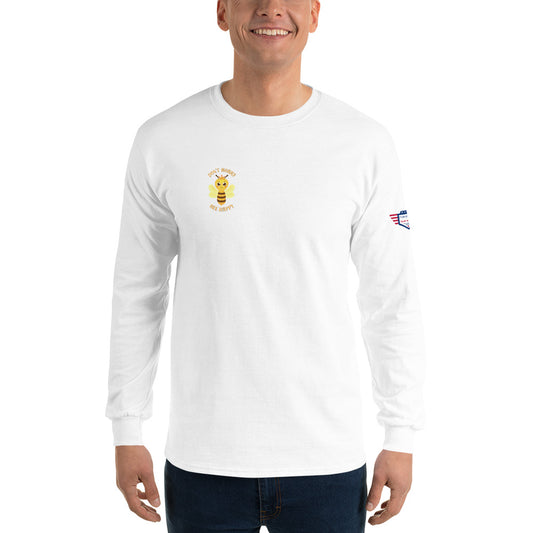 Smiling model rocking front view of white "Dont Worry Bee Happy" long sleeve shirt with yellow bee embroidery and flag sleeve patch