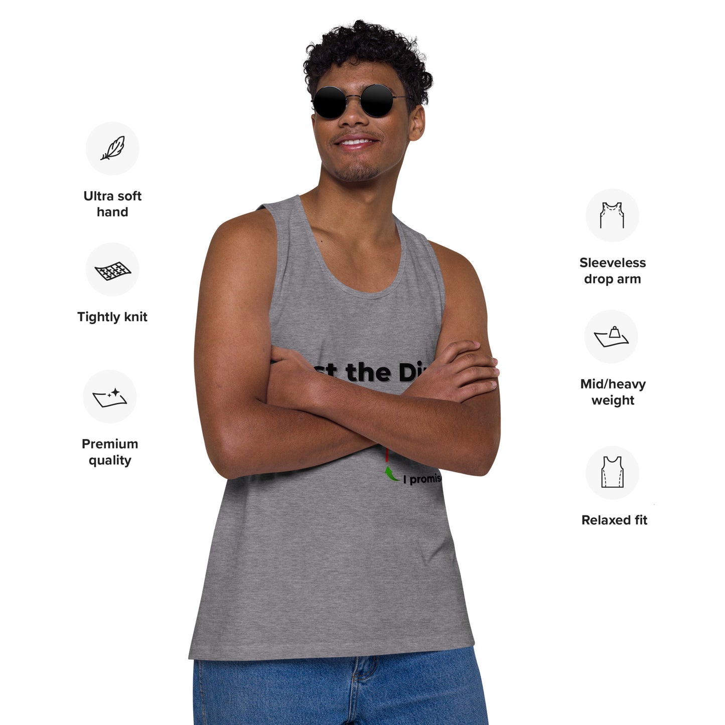 Model arms-crossed in athletic heather gray "Just the Dip" tank, front view with feature icons like ultra soft and relaxed fit