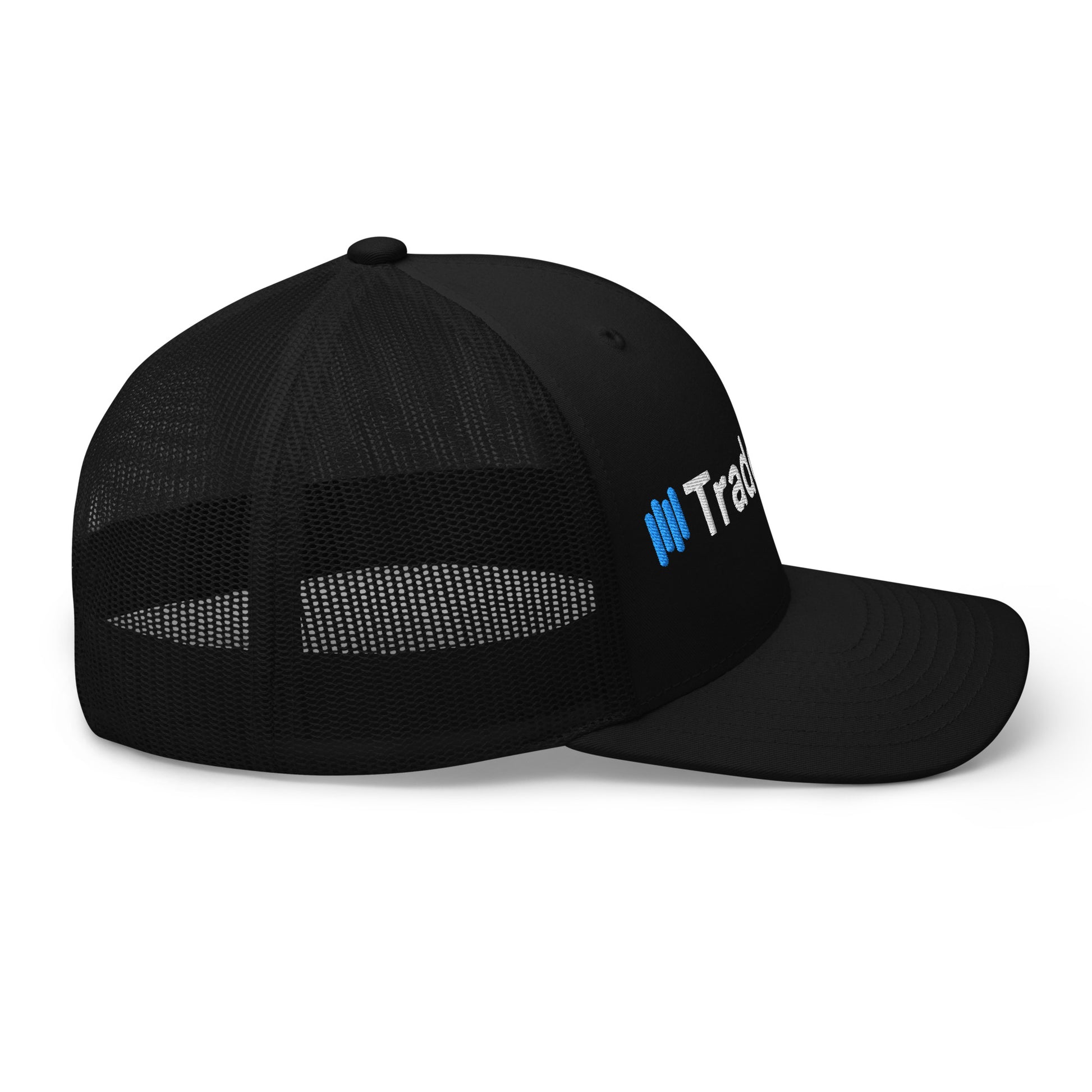 Angled front-right view of black trucker cap, full blue-and-white 3D puff "||TradeCaster" embroidery