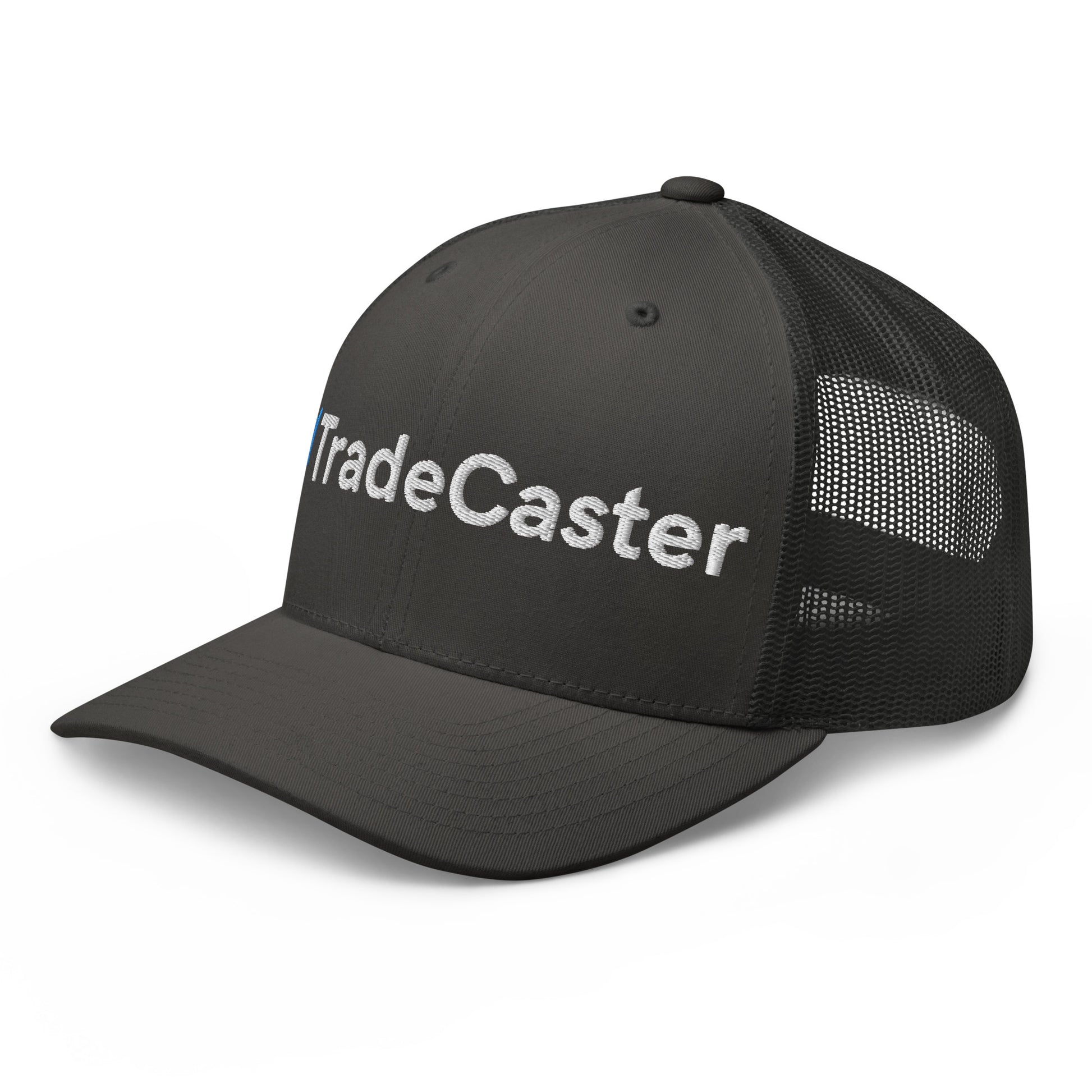 3/4 front-left on black trucker cap, "TradeCaster" embroidery stealing the show