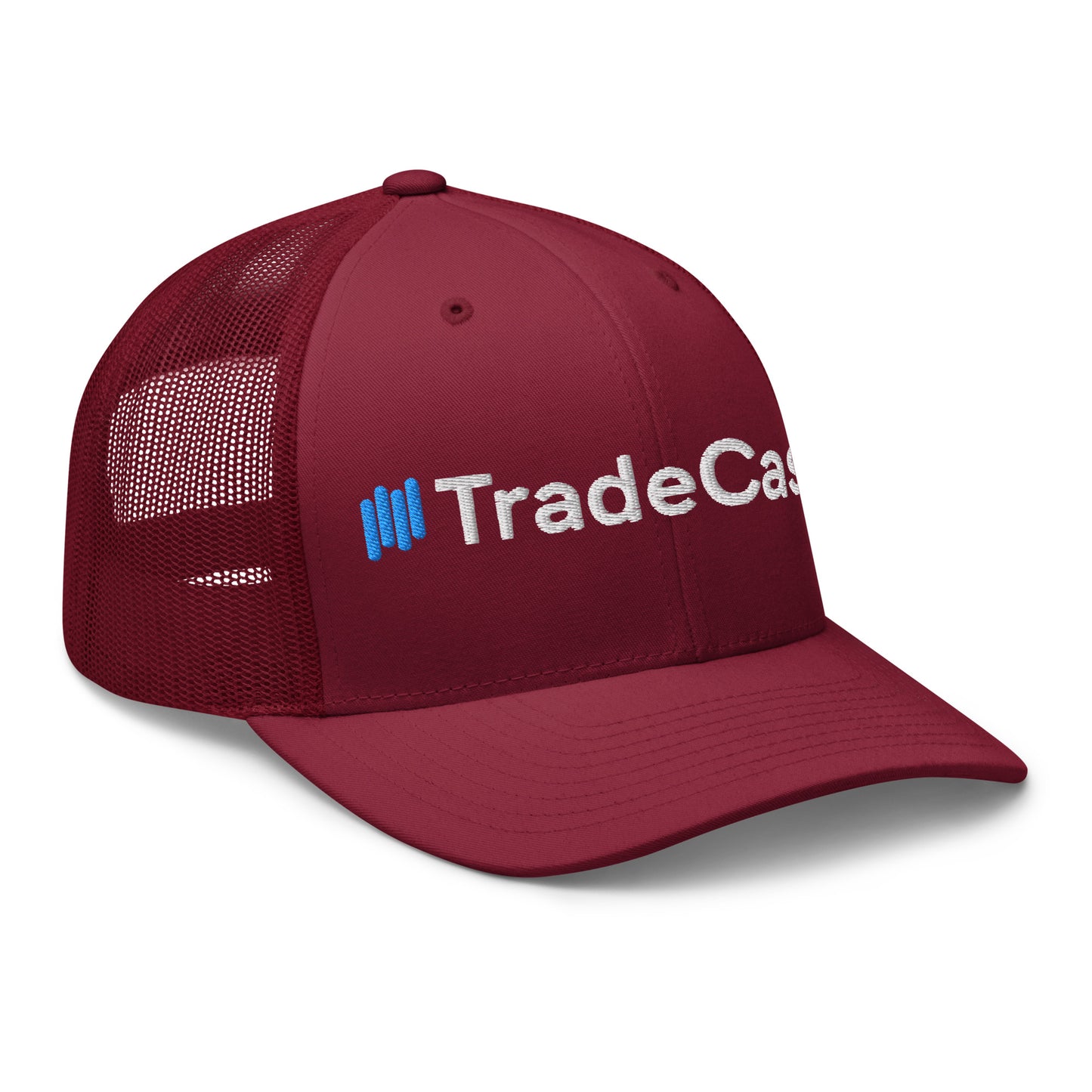Left side profile of burgundy trucker cap, white "TradeCaster" 3D puff embroidery curving over front panel