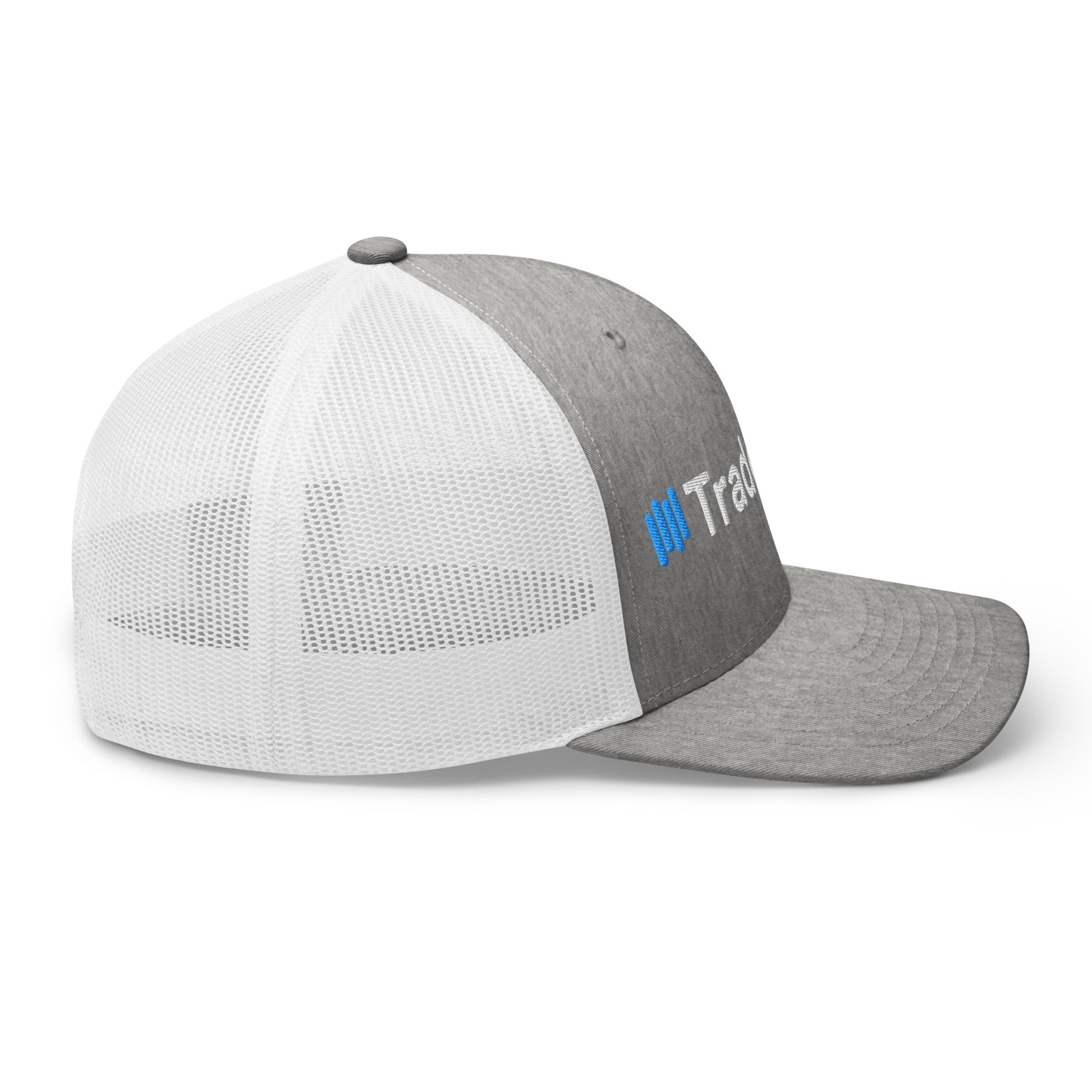 Angled front-left of gray/white trucker cap, 3D puff "||TradeCaster" logo puffed to perfection