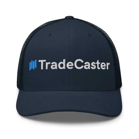 Front view of black TradeCaster trucker cap with white "||TradeCaster" embroidery and blue bars, mesh back