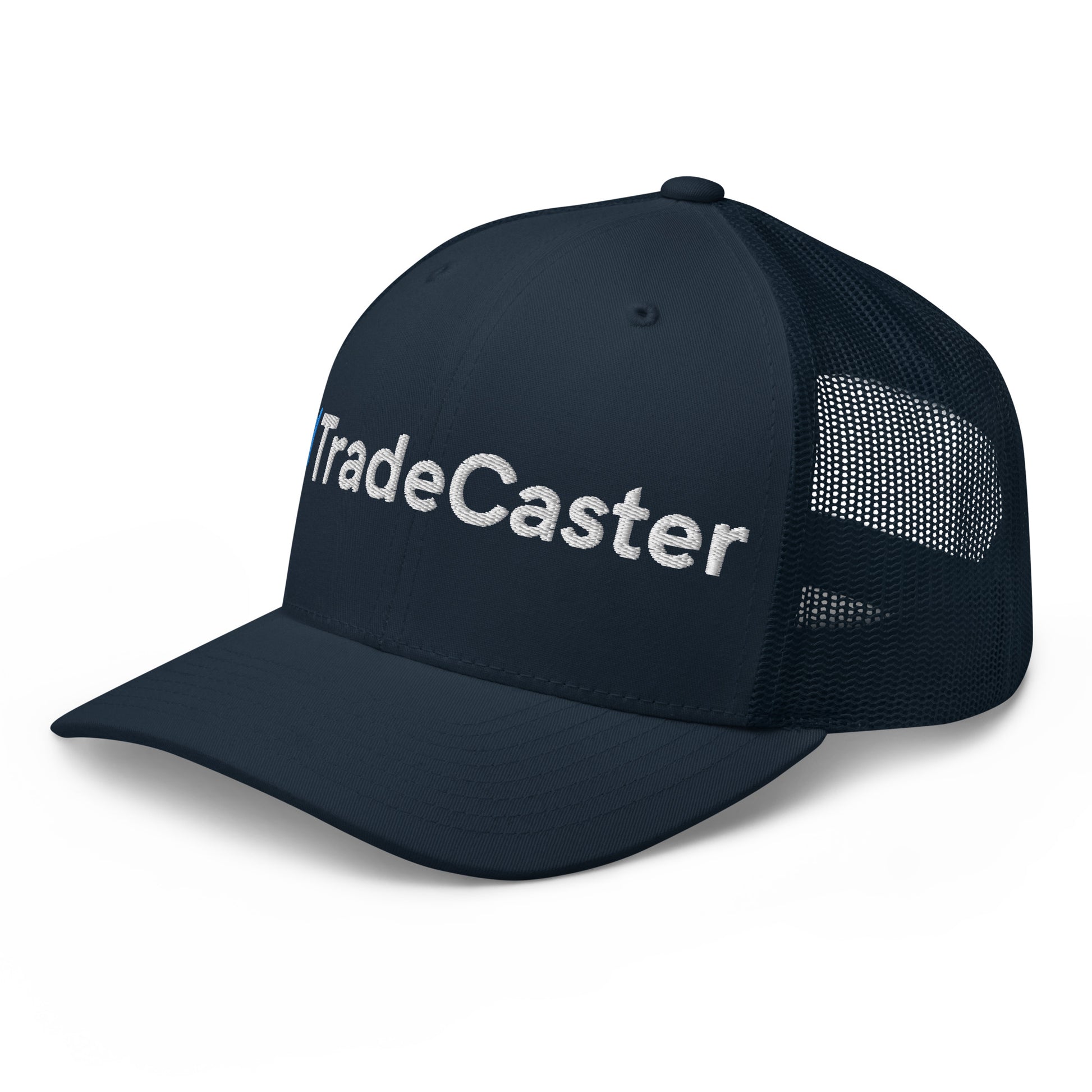 Side angle of navy trucker cap showing partial white "TradeCaster" 3D puff embroidery, dark mesh back