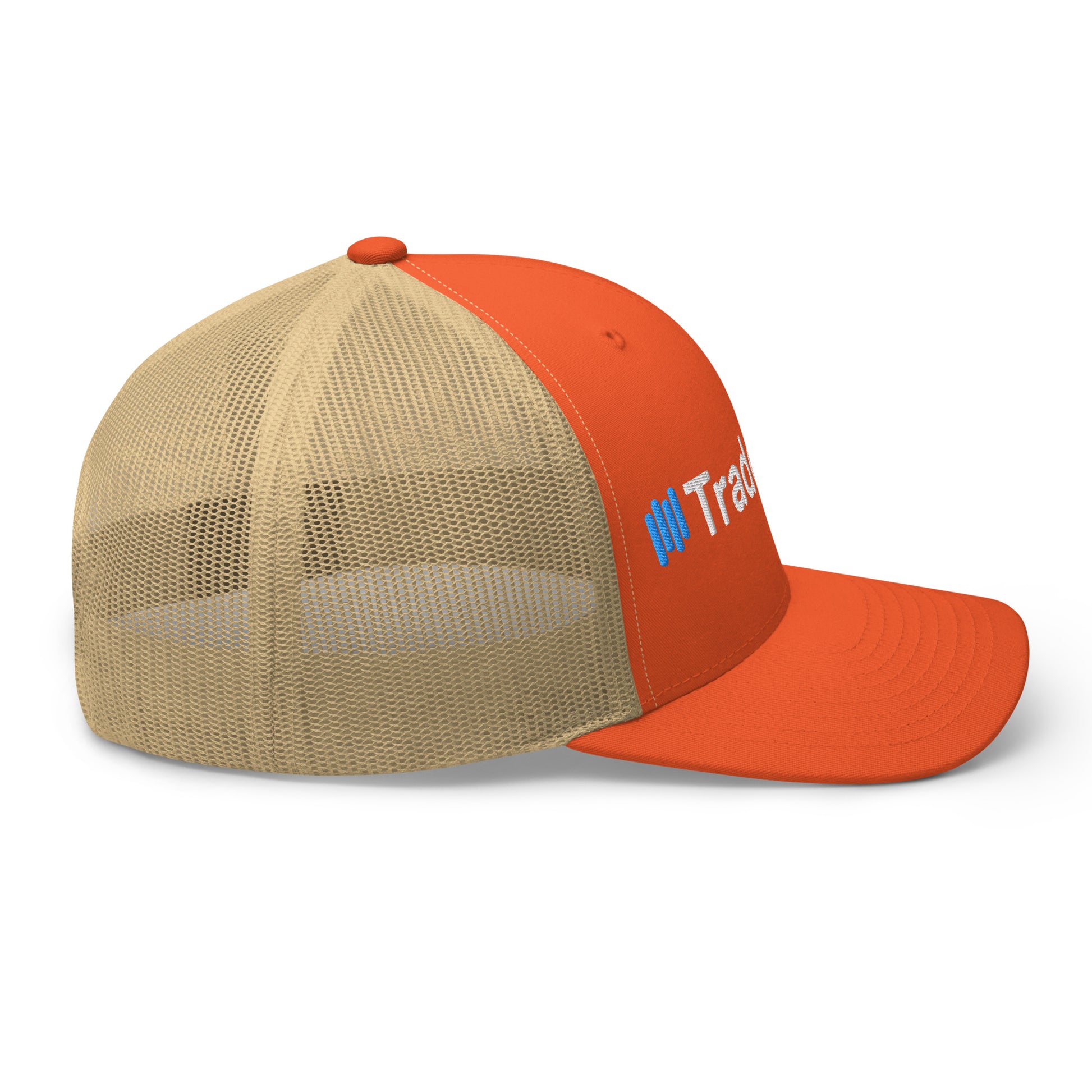Angled front-left of orange TradeCaster cap, full white "TradeCaster" script with blue bars popping