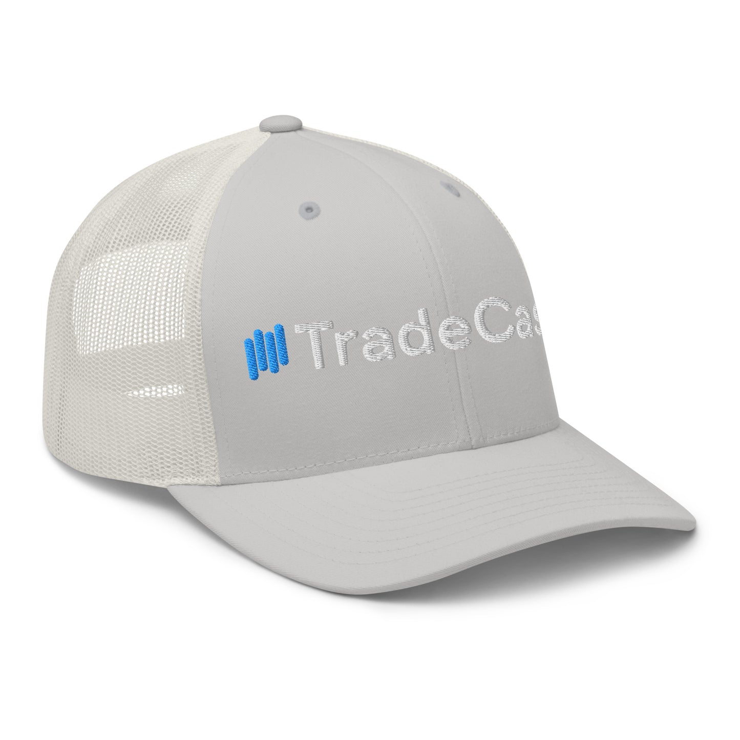 Left profile view of light heather gray cap with partial white/blue "||Trade" embroidery, white mesh
