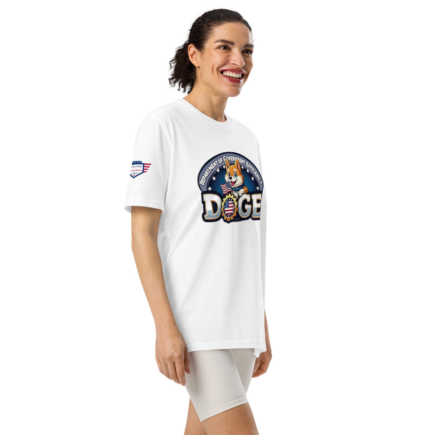 Right side angle of white Under Armour tee on smiling woman, bold DOGE Shiba emblem with eagle & flags