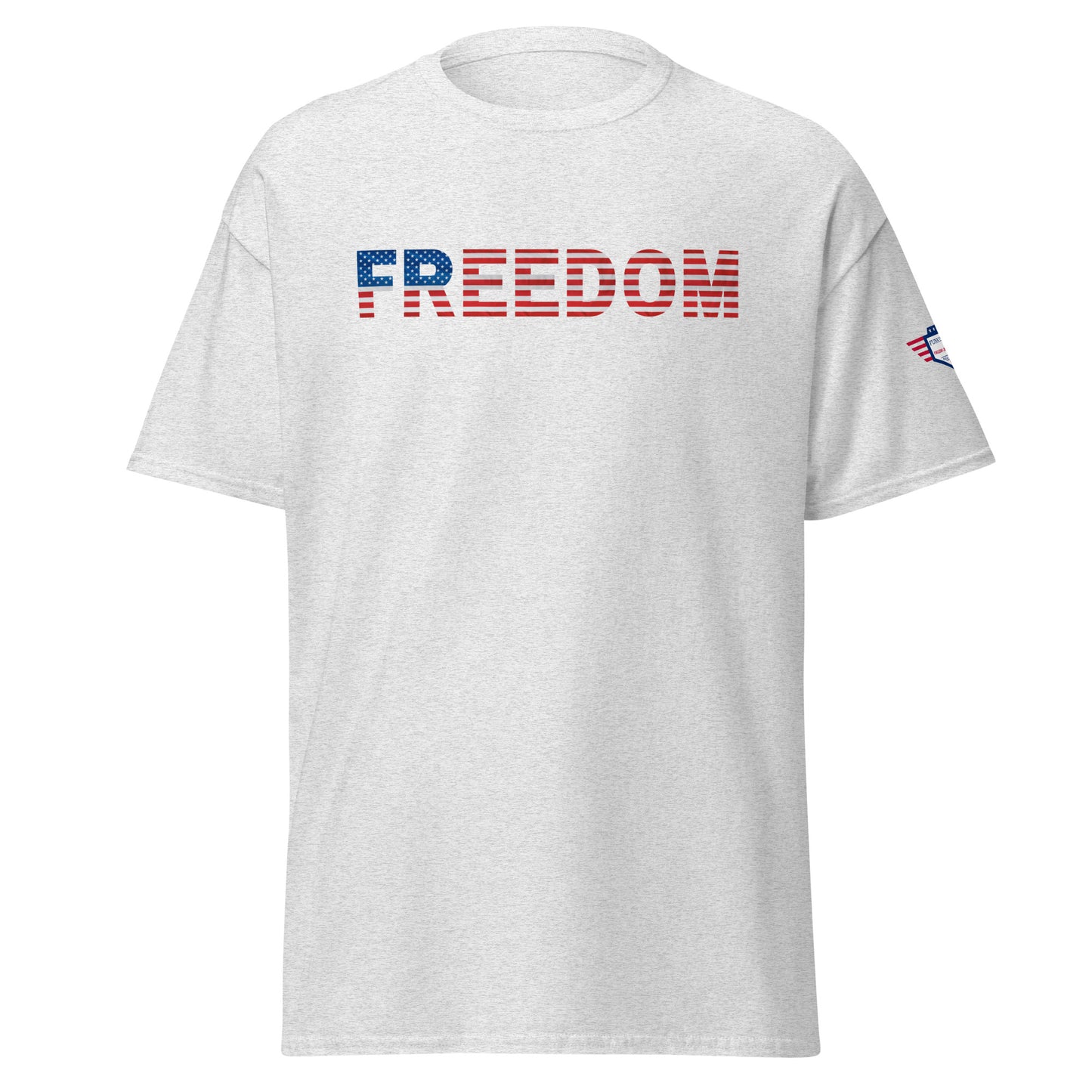 Front view of light gray tee with bold "FREEDOM" text in American flag colors—red stripes, white stars, blue accents