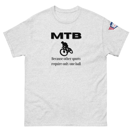 Front view of light grey unisex tee with black "MTB Because other sports require only one ball" meme print, biker silhouette, USA flag sleeve patch