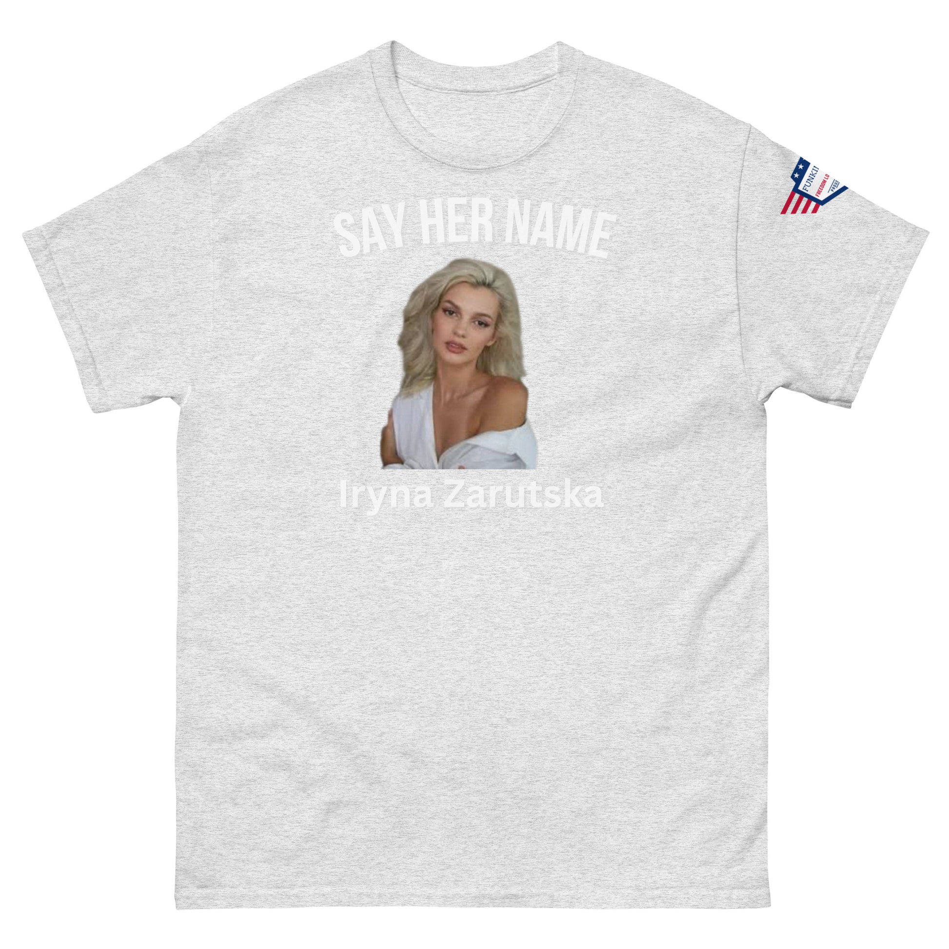 Front view of ash gray "SAY HER NAME" tee with Iryna Zaruska portrait and USA sleeve patch