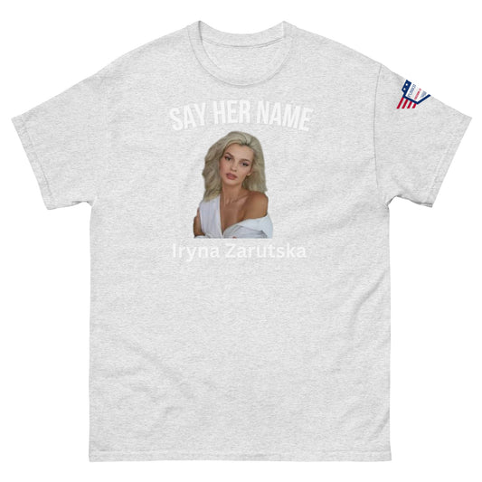Front view of ash gray "SAY HER NAME" tee with Iryna Zaruska portrait and USA sleeve patch