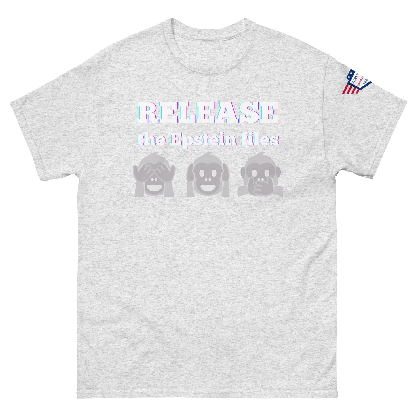 Front view of ash gray unisex t-shirt with prismatic "RELEASE the Epstein files" text, see-no-evil monkey emojis, USA flag shoulder patch