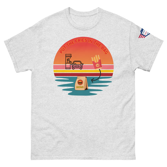Front view of ash gray unisex T-shirt with "Put the fries in the bag" sunset drive-thru meme print and flag sleeve patch