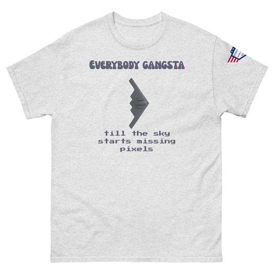 Front view of light gray unisex tee with purple "Everybody Gangsta" text, gray stealth bomber graphic, teal "till the sky starts missing pixels" glitch print, flag sleeve patch