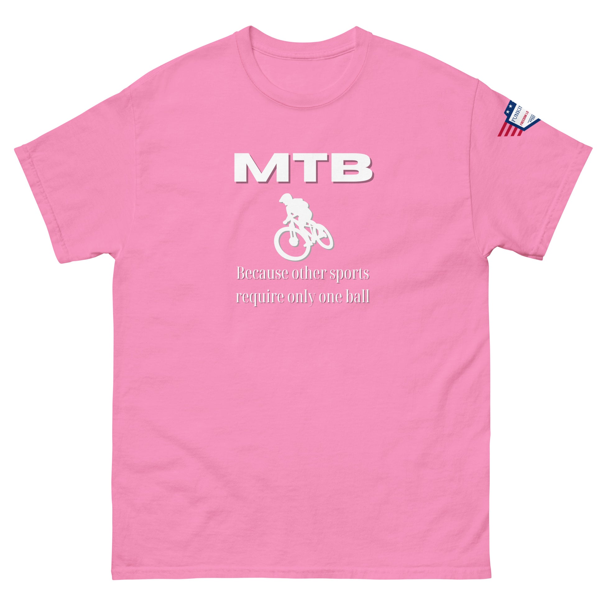 Front view of pink unisex t-shirt featuring white "MTB", jumping biker graphic, "Because other sports require only one ball" text, flag on sleeve