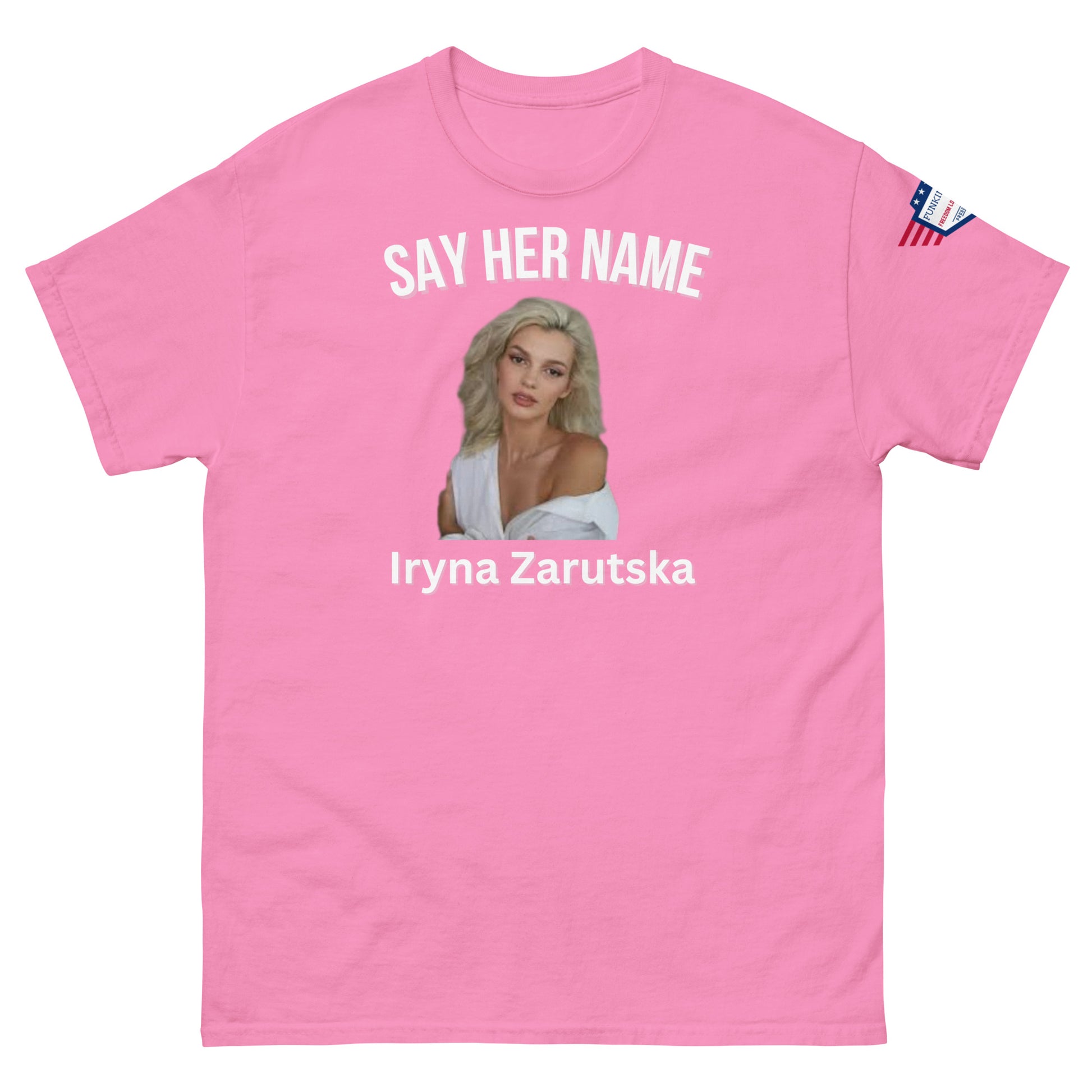 Front view of pink "SAY HER NAME" tee featuring Iryna Zaruska portrait, USA sleeve patch