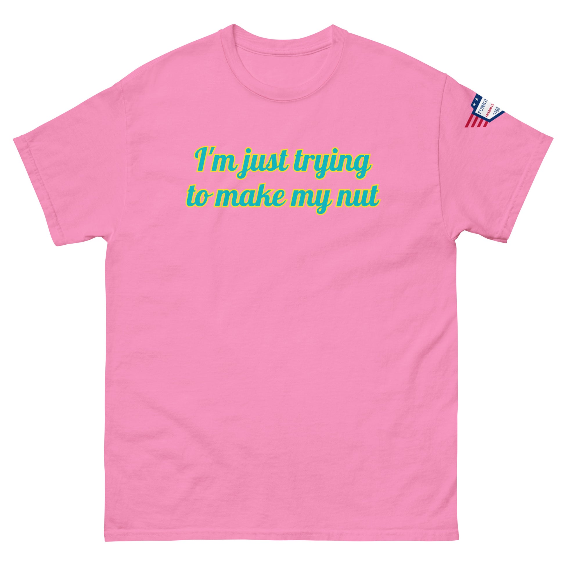 Front view of hot pink unisex tee saying "I'm just trying to make my nut" in teal cursive, US flag on sleeve