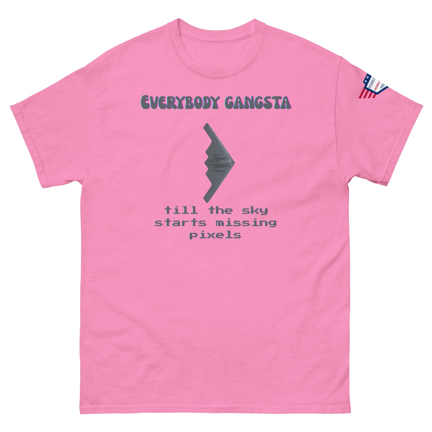 Front view of pink unisex tee with purple "Everybody Gangsta" text, gray stealth bomber graphic, teal "till the sky starts missing pixels" glitch print, flag sleeve patch