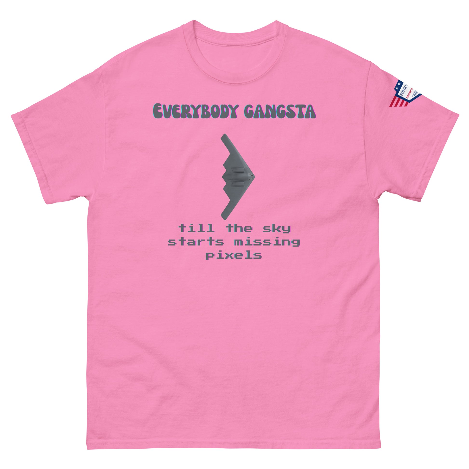 Front view of pink unisex tee with purple "Everybody Gangsta" text, gray stealth bomber graphic, teal "till the sky starts missing pixels" glitch print, flag sleeve patch