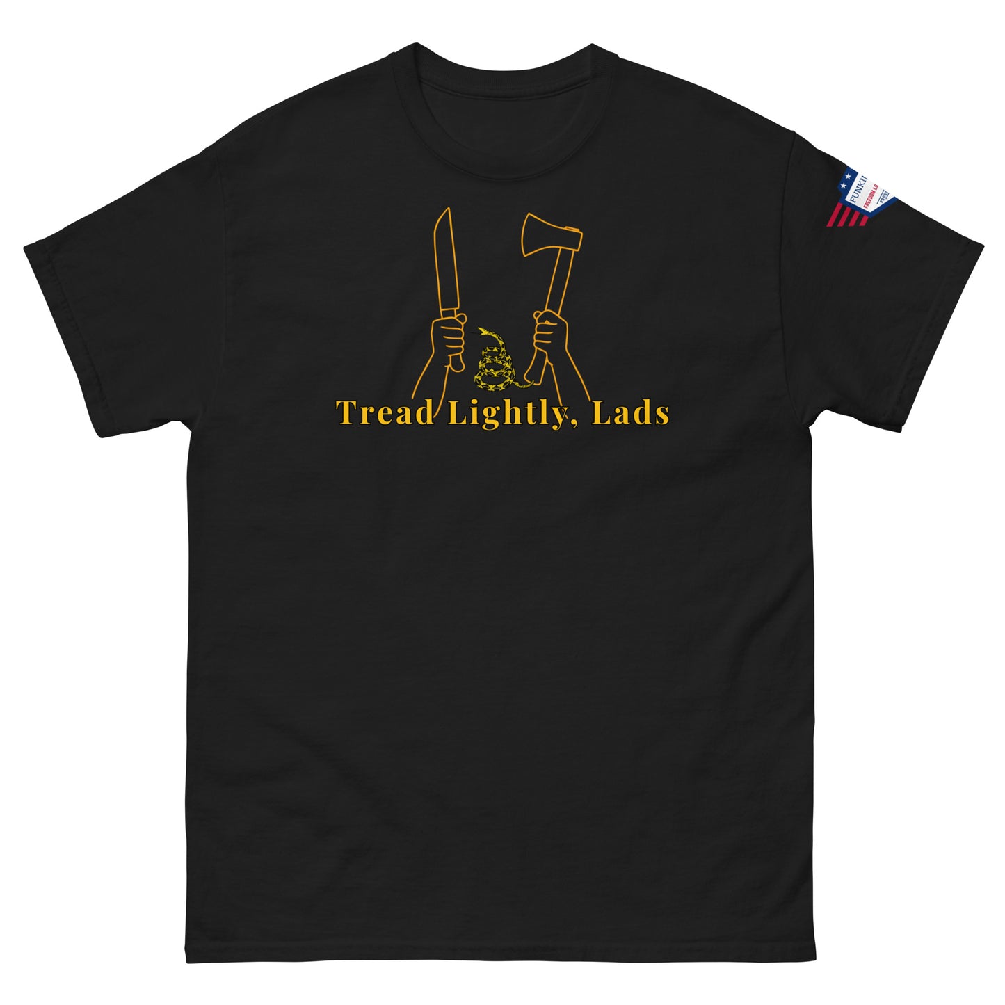 Front view of black unisex tee with gold "Tread Lightly, Lads" print, hands gripping knife & axe around coiled Gadsden snake, US flag sleeve patch