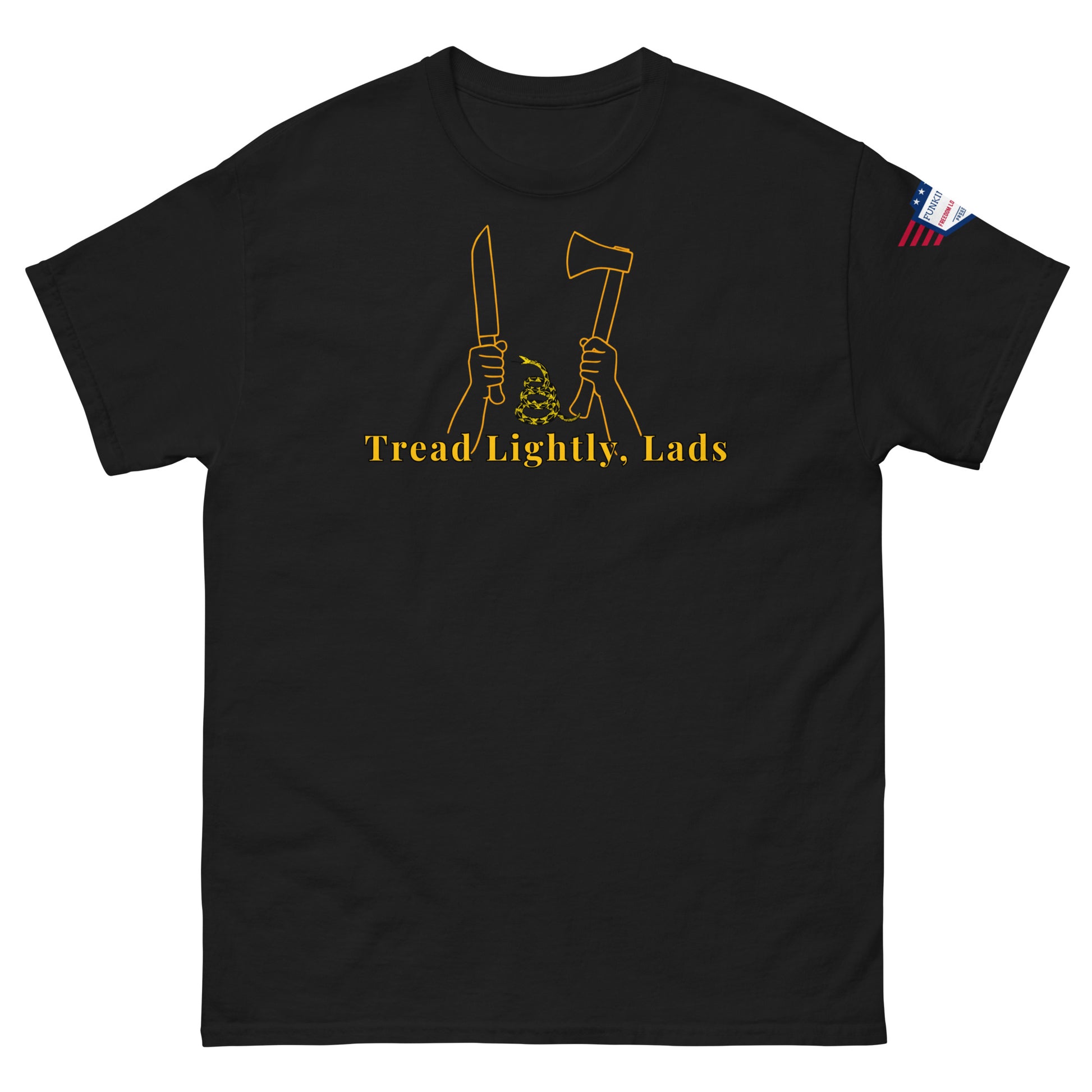 Front view of black unisex tee with gold "Tread Lightly, Lads" print, hands gripping knife & axe around coiled Gadsden snake, US flag sleeve patch