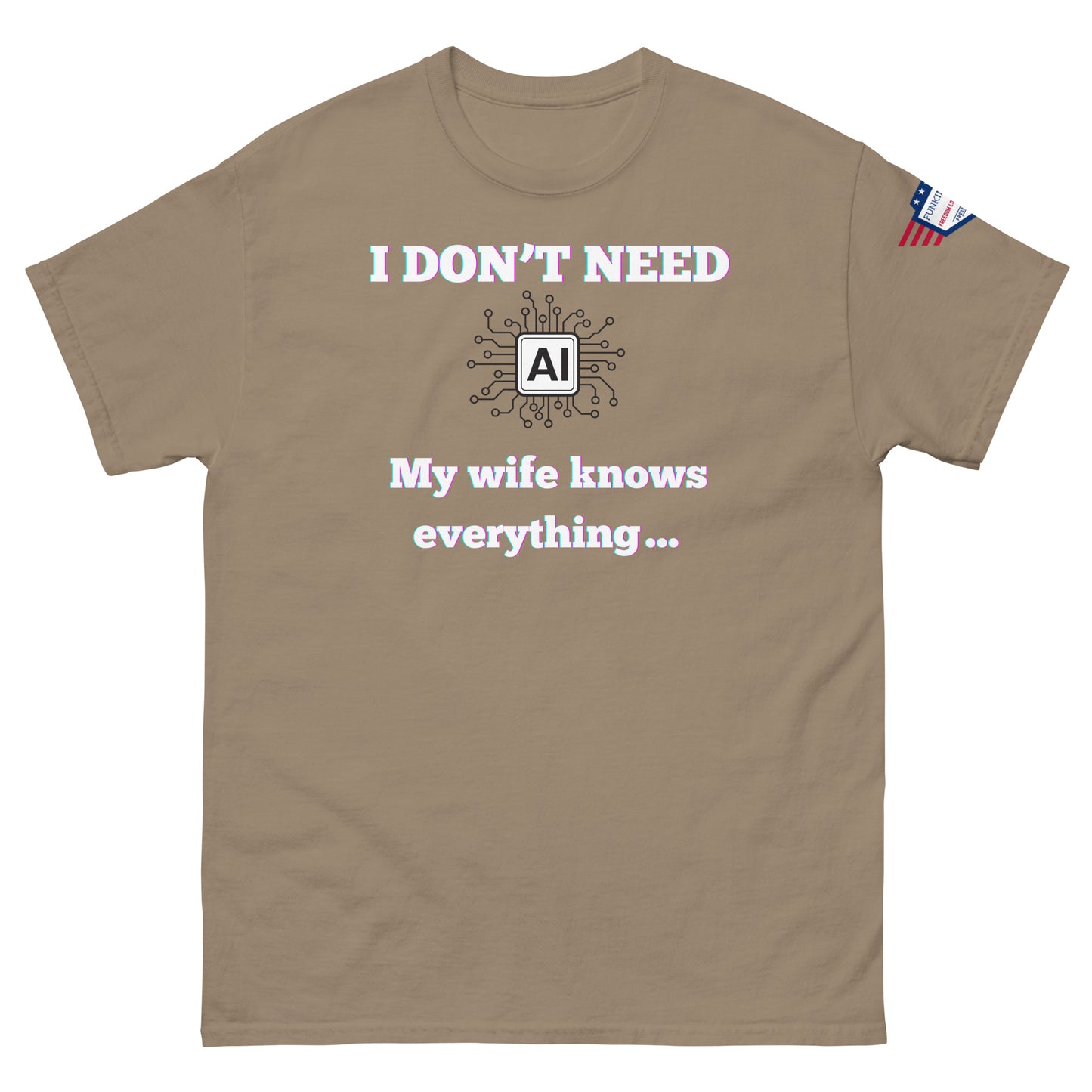 Front view of tan unisex tee with glowing "I DON'T NEED" over AI circuit icon, "My wife knows everything..." print, flag sleeve patch