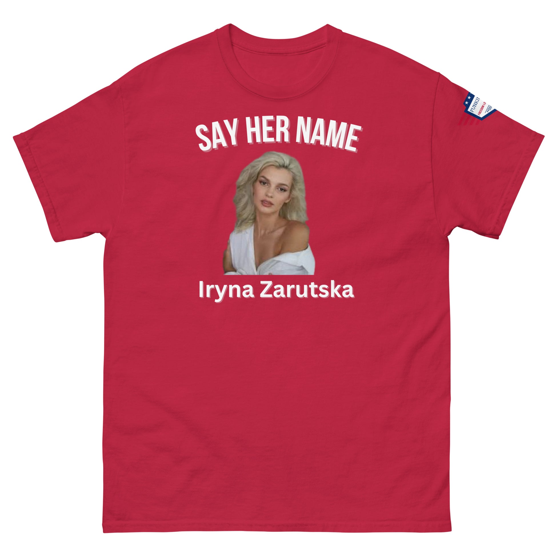 Front view of red "SAY HER NAME" funny tee with Iryna Zaruska portrait, USA sleeve patch