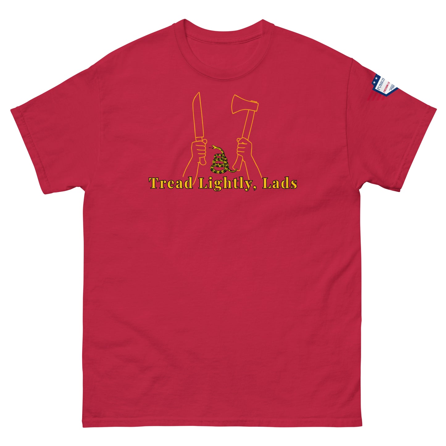 Front view of red unisex tee with gold "Tread Lightly, Lads" print, hands gripping knife & axe around coiled Gadsden snake, US flag sleeve patch