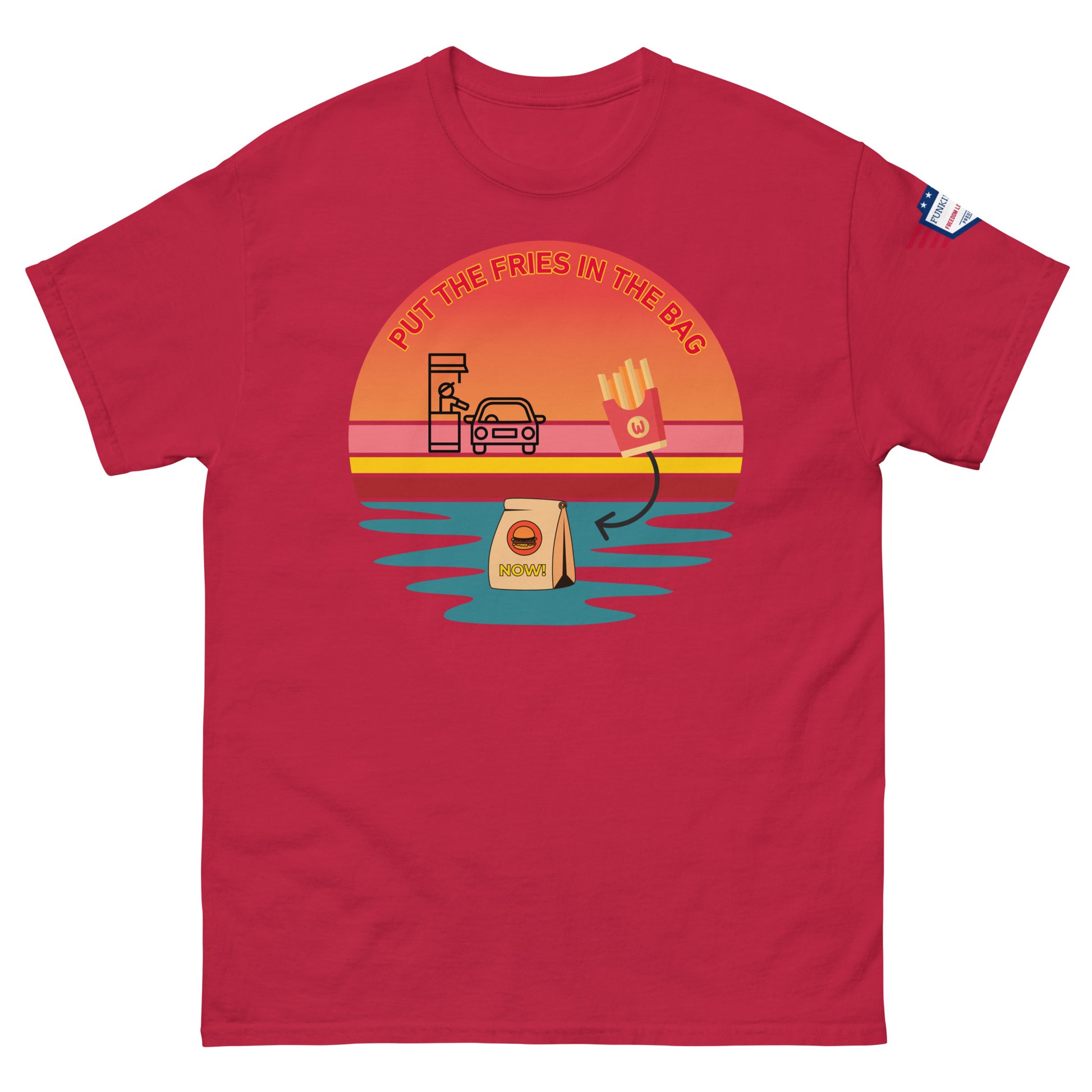 Front view of red unisex T-shirt with "Put the fries in the bag" colorful sunset drive-thru graphic and flag sleeve patch