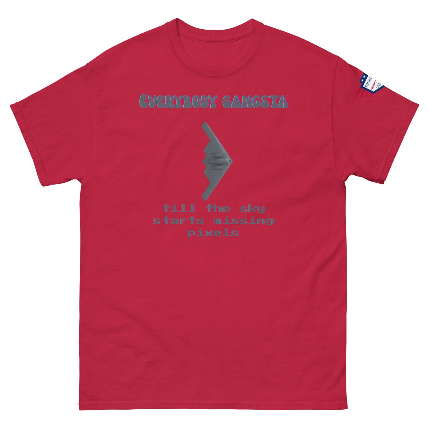Front view of red unisex tee with purple "Everybody Gangsta" text, gray stealth bomber graphic, teal "till the sky starts missing pixels" glitch print, flag sleeve patch