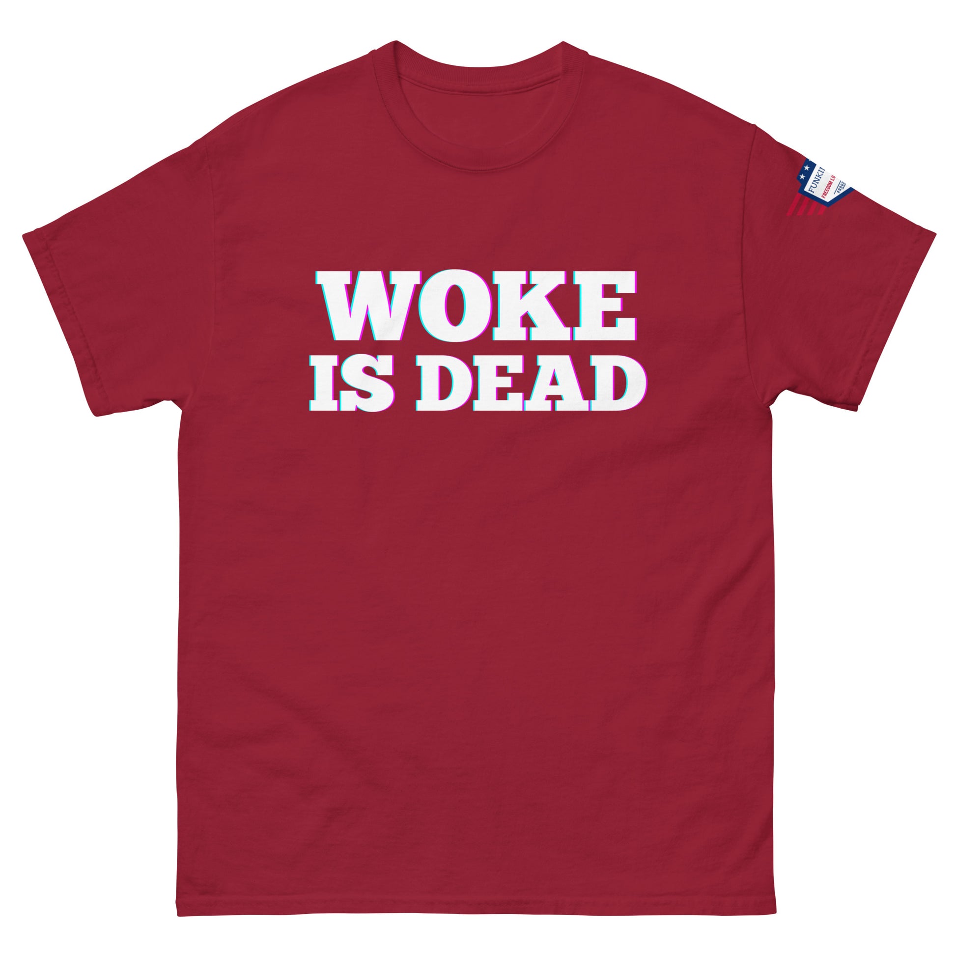 Front view of maroon "WOKE IS DEAD" tee with bold white glowing text and US flag patch on sleeve