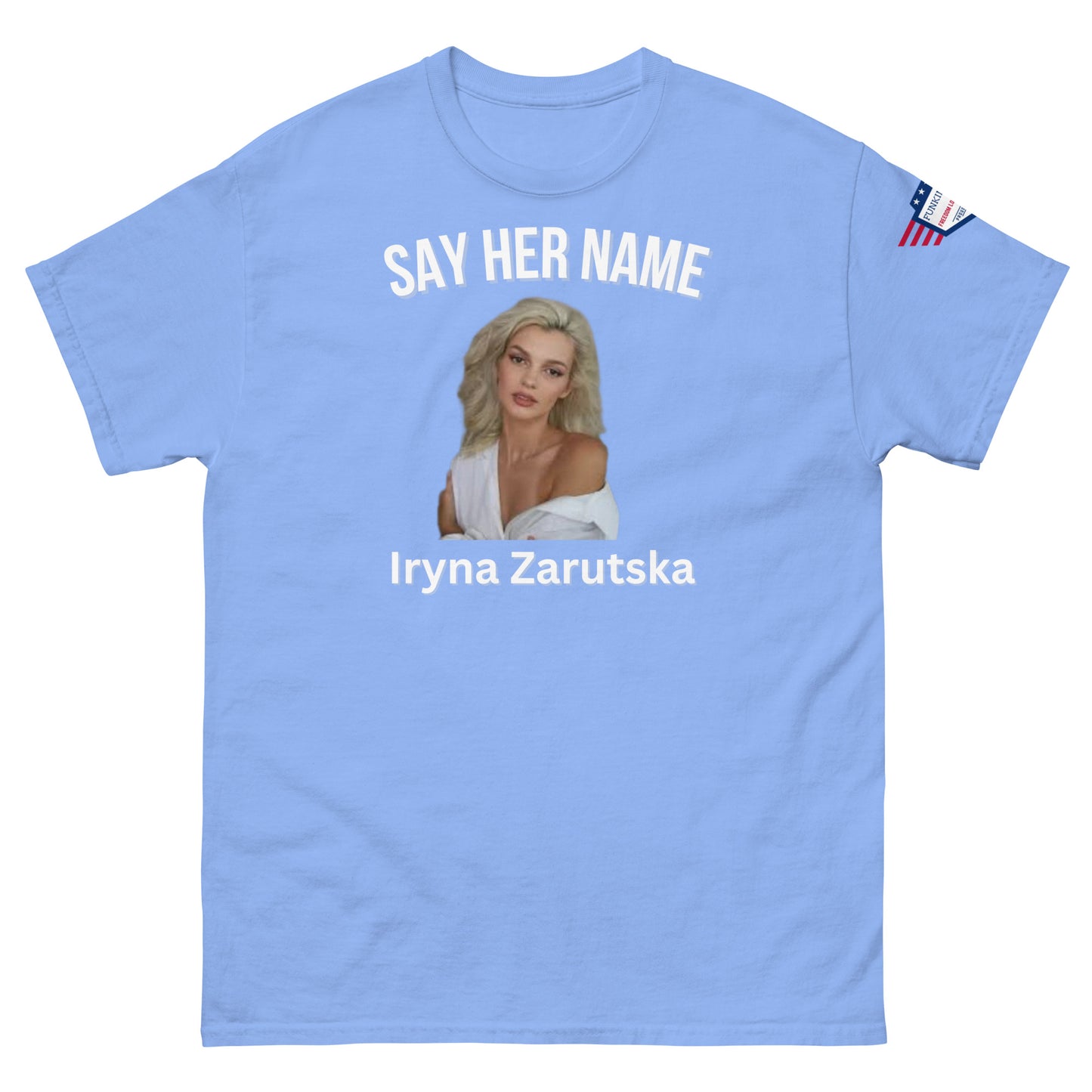 Front view of light blue "SAY HER NAME" tee with Iryna Zaruska portrait, USA sleeve patch