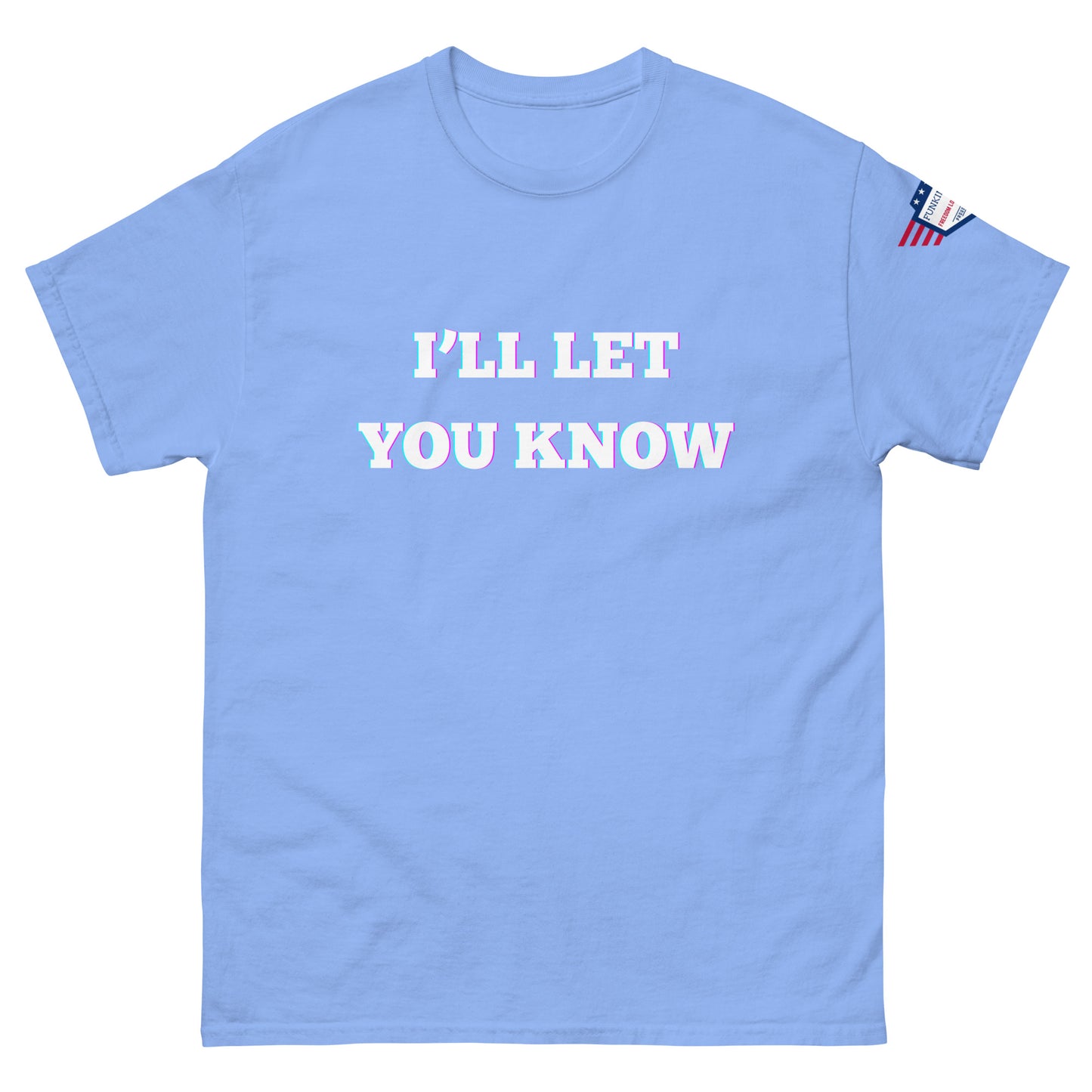 Front view of sky blue unisex t-shirt showing glitchy "I'LL LET YOU KNOW" text and tiny USA flag sleeve detail