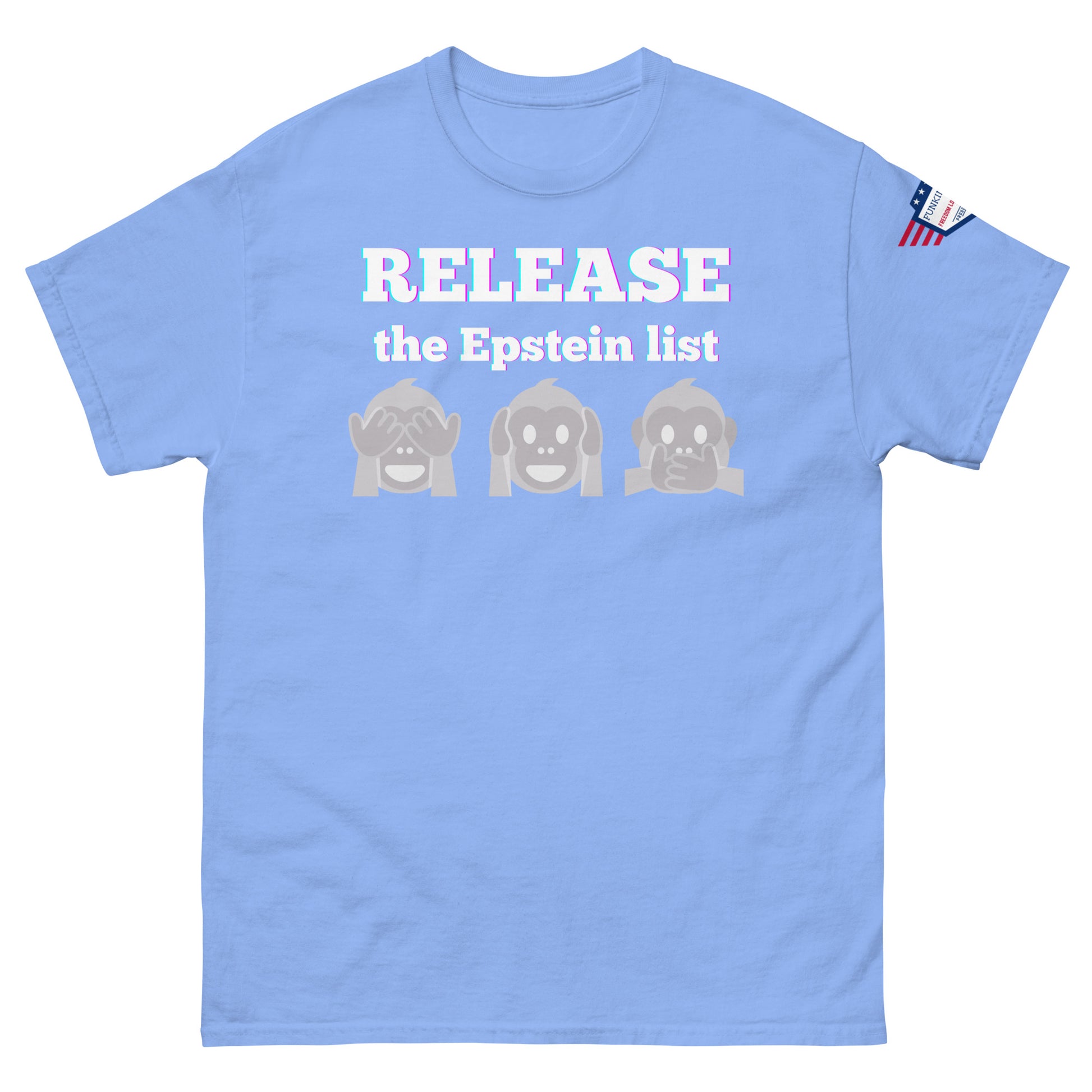 Light blue unisex tee front view, glowing "RELEASE THE EPSTEIN LIST" print with gray monkey emojis, US flag sleeve patch