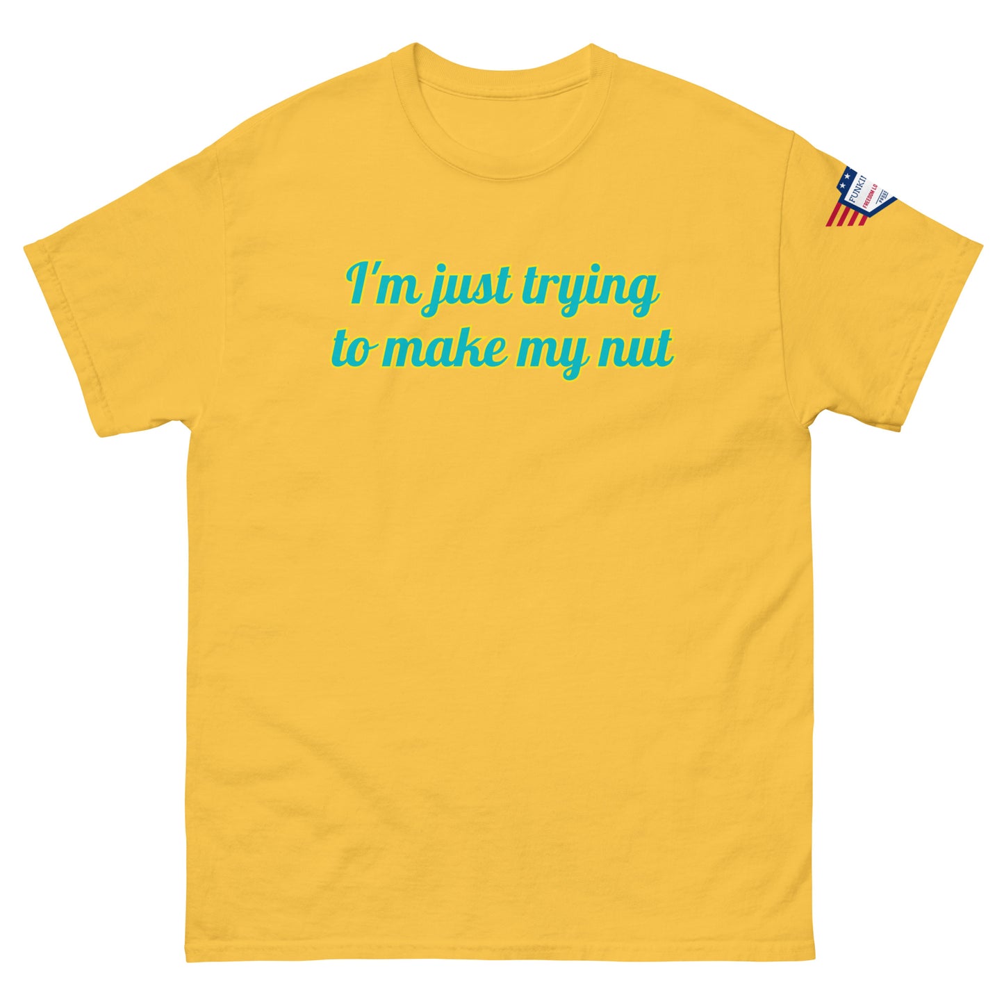 Front view of yellow unisex tee with cheeky "I'm just trying to make my nut" teal text, flag on sleeve