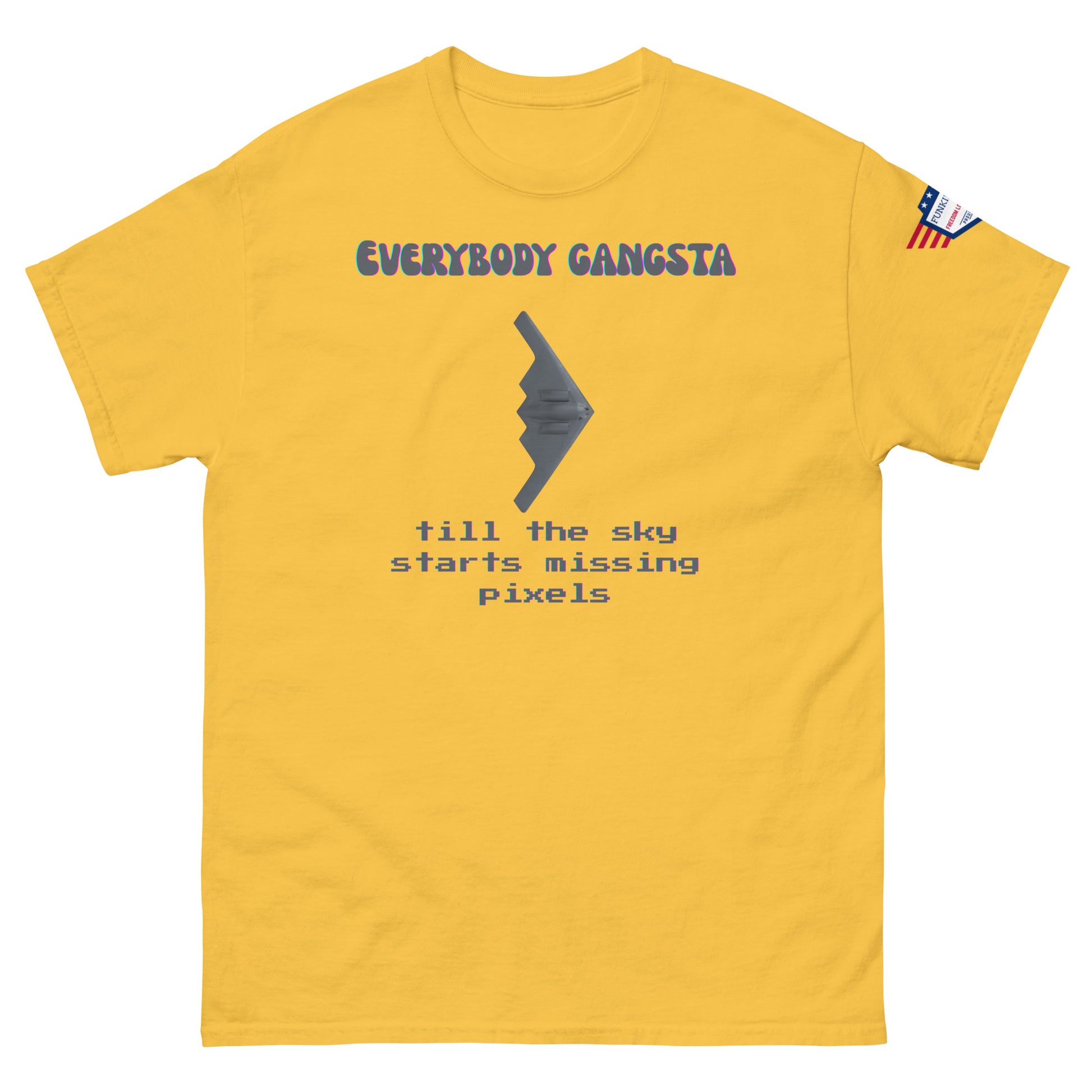 Front view of yellow unisex tee with purple "Everybody Gangsta" text, gray stealth bomber graphic, teal "till the sky starts missing pixels" glitch print, flag sleeve patch