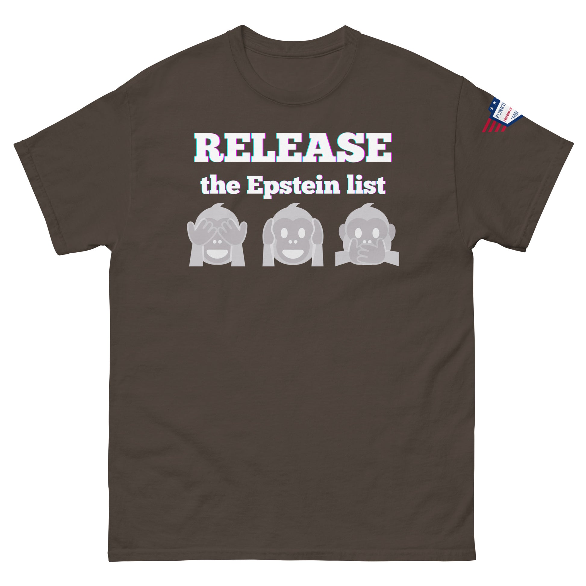 Sand brown unisex tee front view, glowing "RELEASE THE EPSTEIN LIST" print with gray monkey emojis, US flag sleeve patch
