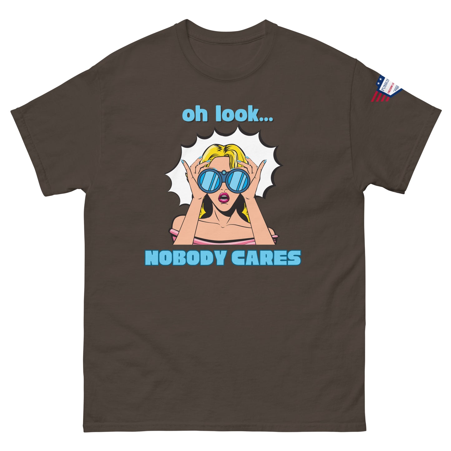 Front view of dark brown unisex t-shirt with cyan "Oh look..." text, pop-art blonde diva in blue shades yelling "NOBODY CARES", USA flag sleeve patch