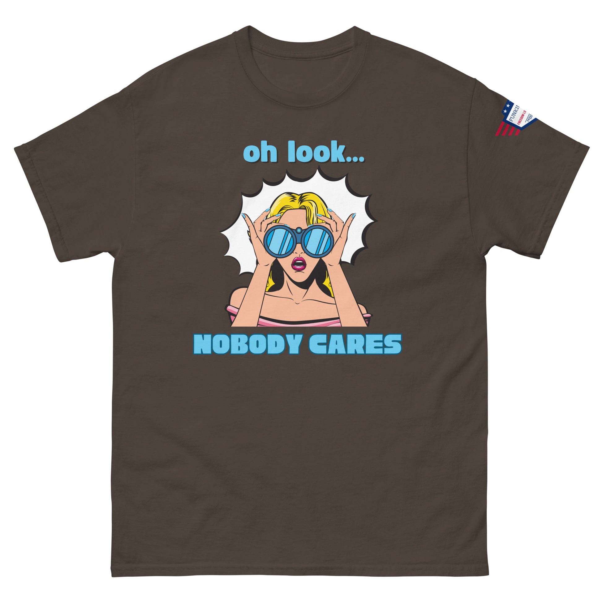 Front view of dark brown unisex t-shirt with cyan "Oh look..." text, pop-art blonde diva in blue shades yelling "NOBODY CARES", USA flag sleeve patch