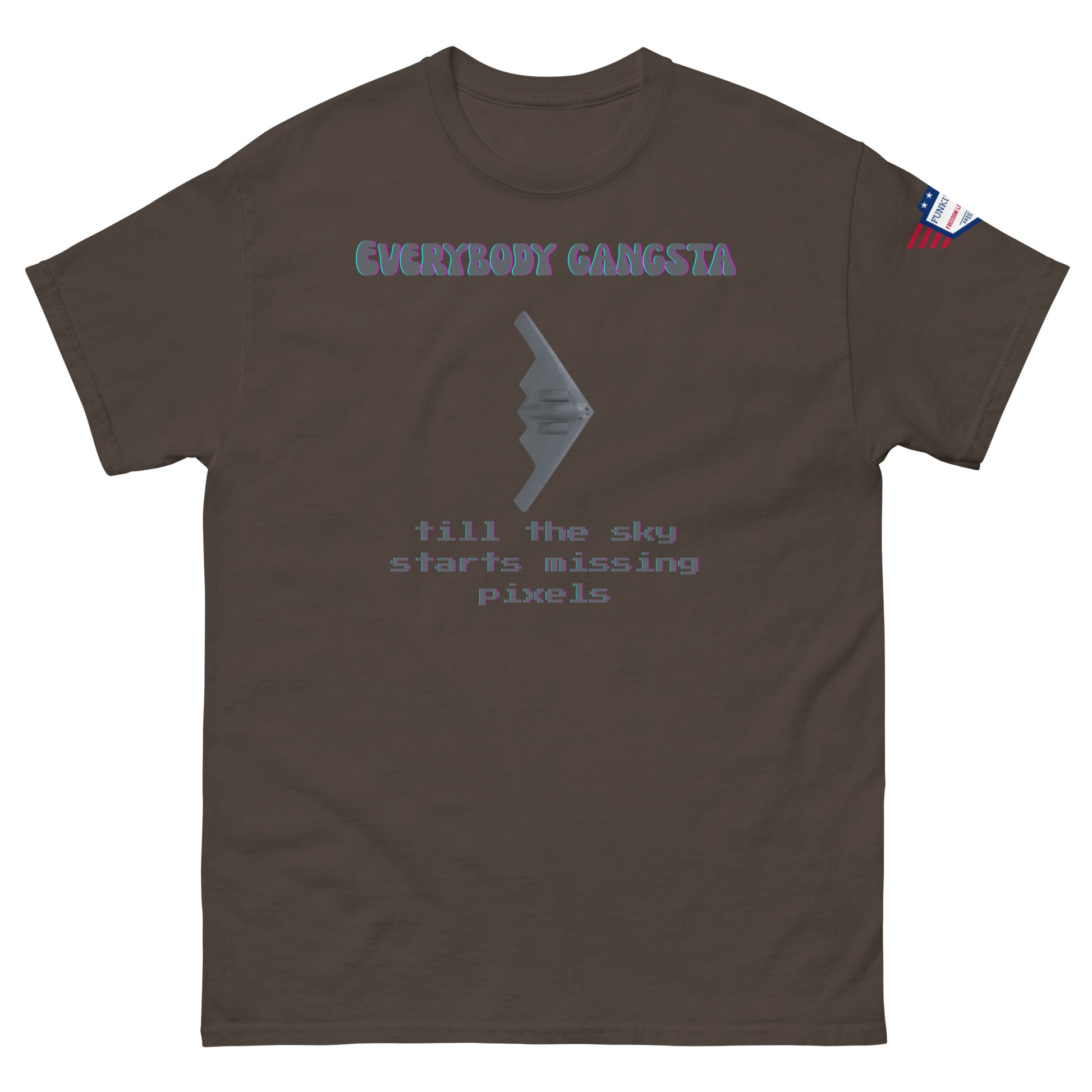 Front view of dark brown unisex tee with purple "Everybody Gangsta" text, gray stealth bomber graphic, teal "till the sky starts missing pixels" glitch print, flag sleeve patch
