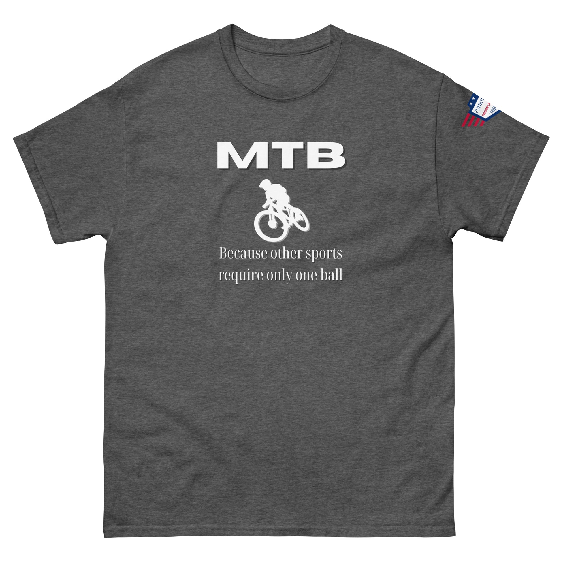 Front view of charcoal gray unisex t-shirt featuring white "MTB", biker graphic, "Because other sports require only one ball" text, flag patch