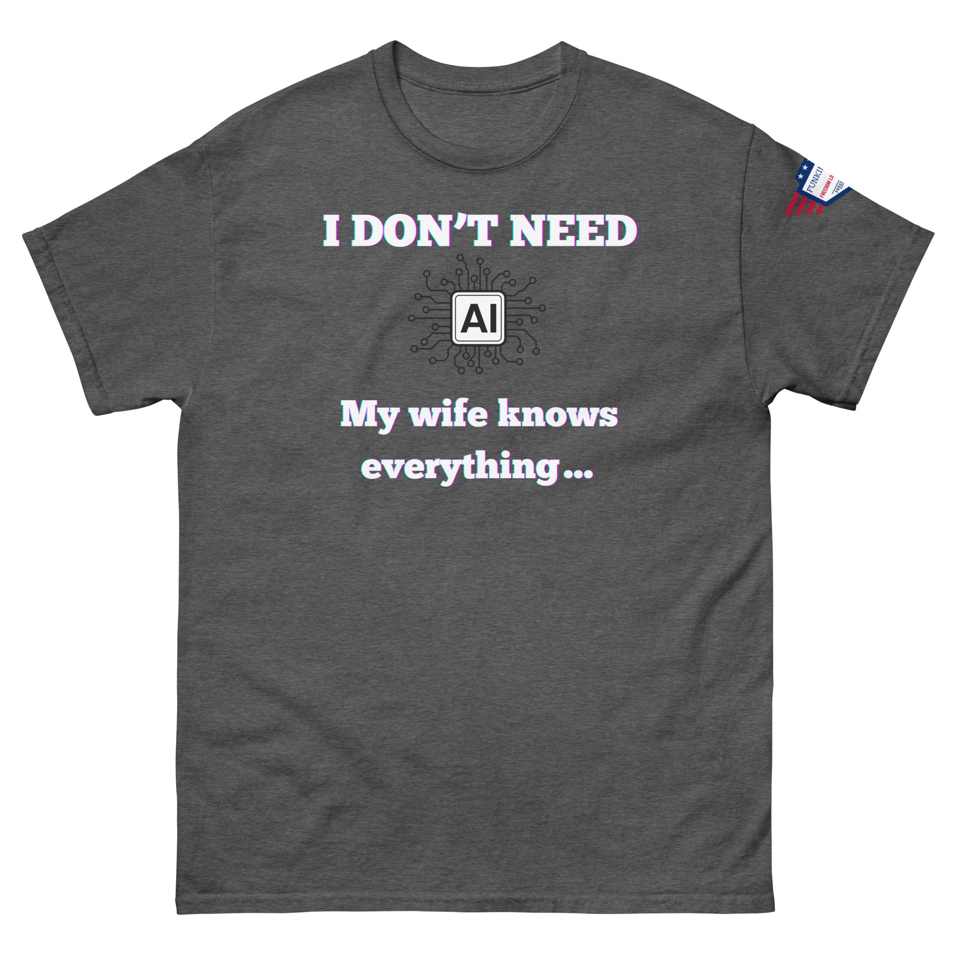 Front view of charcoal grey unisex t-shirt showing glowing "I DON'T NEED AI My wife knows everything..." print and USA flag detail