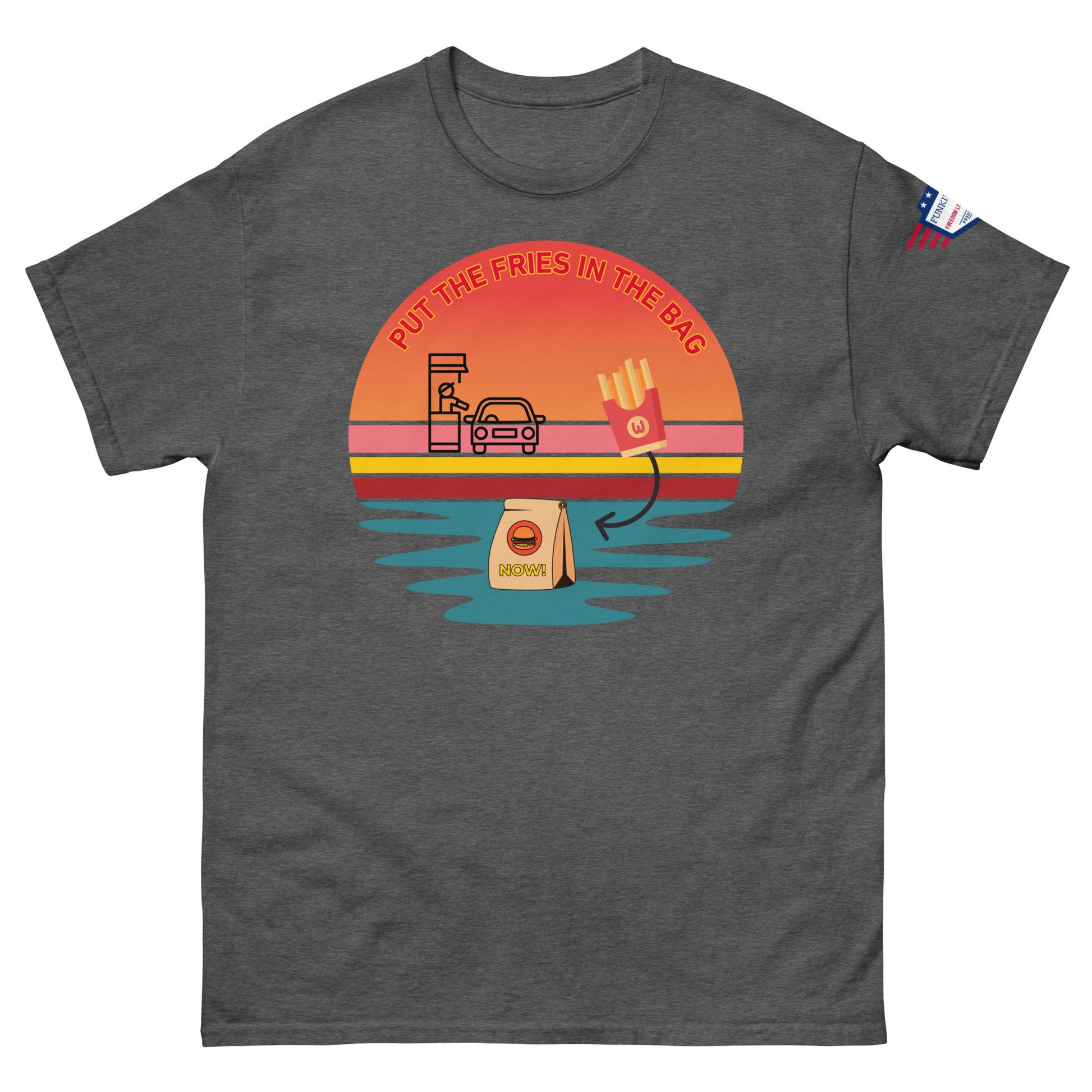 Front view of charcoal gray unisex T-shirt showing "Put the fries in the bag" retro drive-thru meme sunset and flag patch