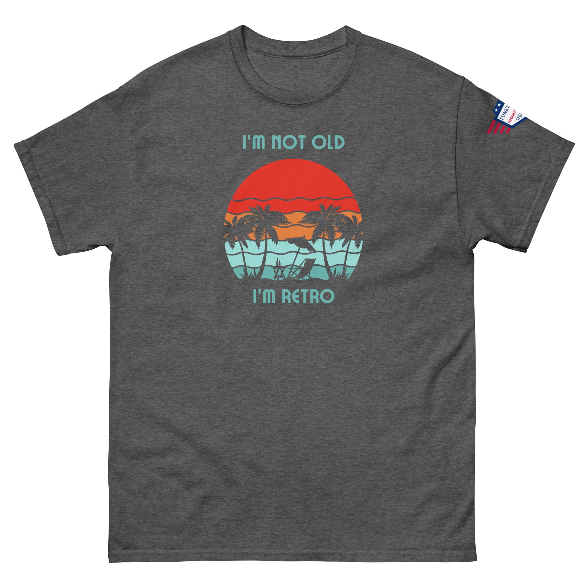 Front view of gray unisex t-shirt with "I'm not old I'm retro" text and sunset beach hammock print, flag sleeve detail