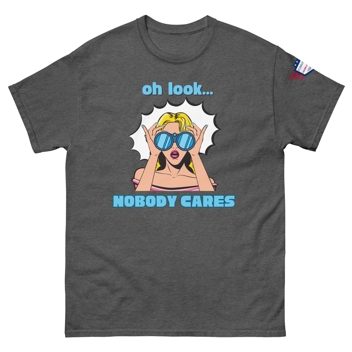 Front view of medium gray unisex t-shirt with cyan "Oh look..." text, pop-art blonde diva in blue shades yelling "NOBODY CARES", USA flag sleeve patch