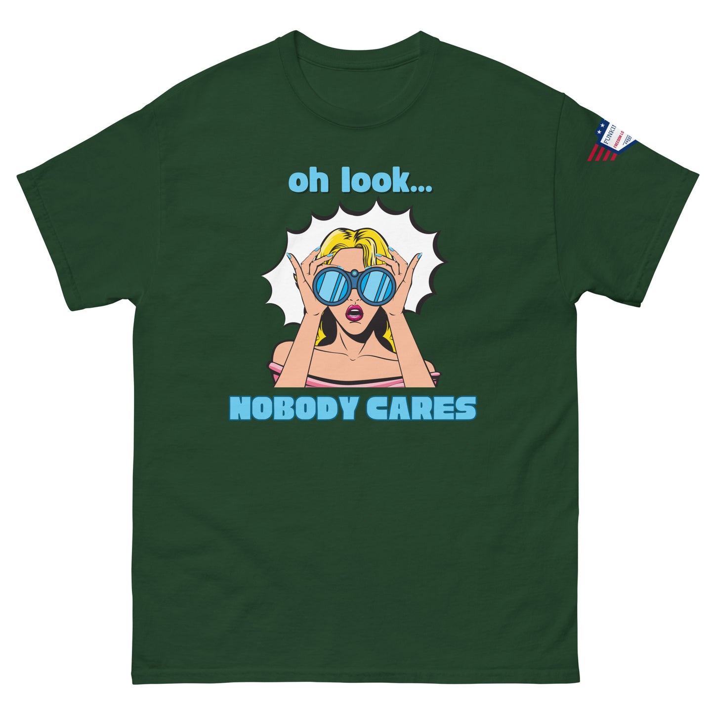 Front view of forest green unisex t-shirt with bold "oh look... NOBODY CARES" comic-style graphic and flag patch